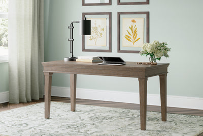 Tampa Furniture Outlet Lutz - Ashley Furniture - Janismore Office Desk - Home Office Desk / Weathered Gray - H776-44