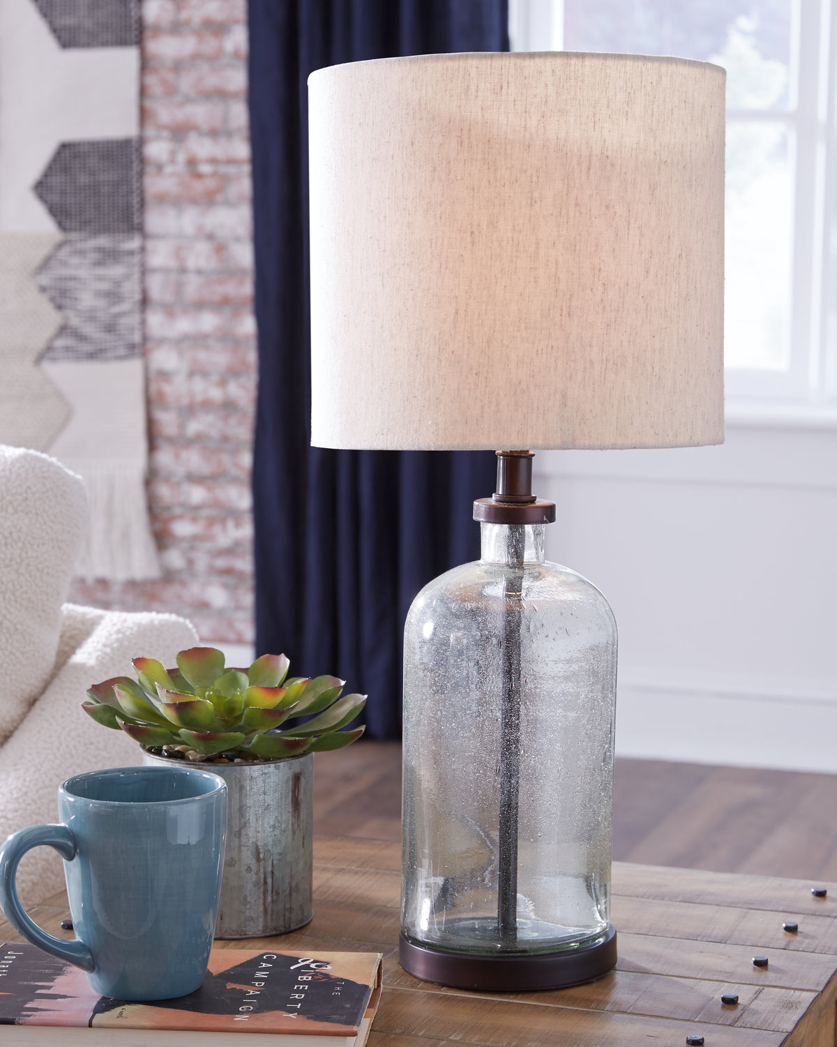 Tampa Furniture Outlet Lutz - Ashley Furniture - Bandile Lighting - Glass Table Lamp (1/CN) / Clear/Bronze Finish - L430674