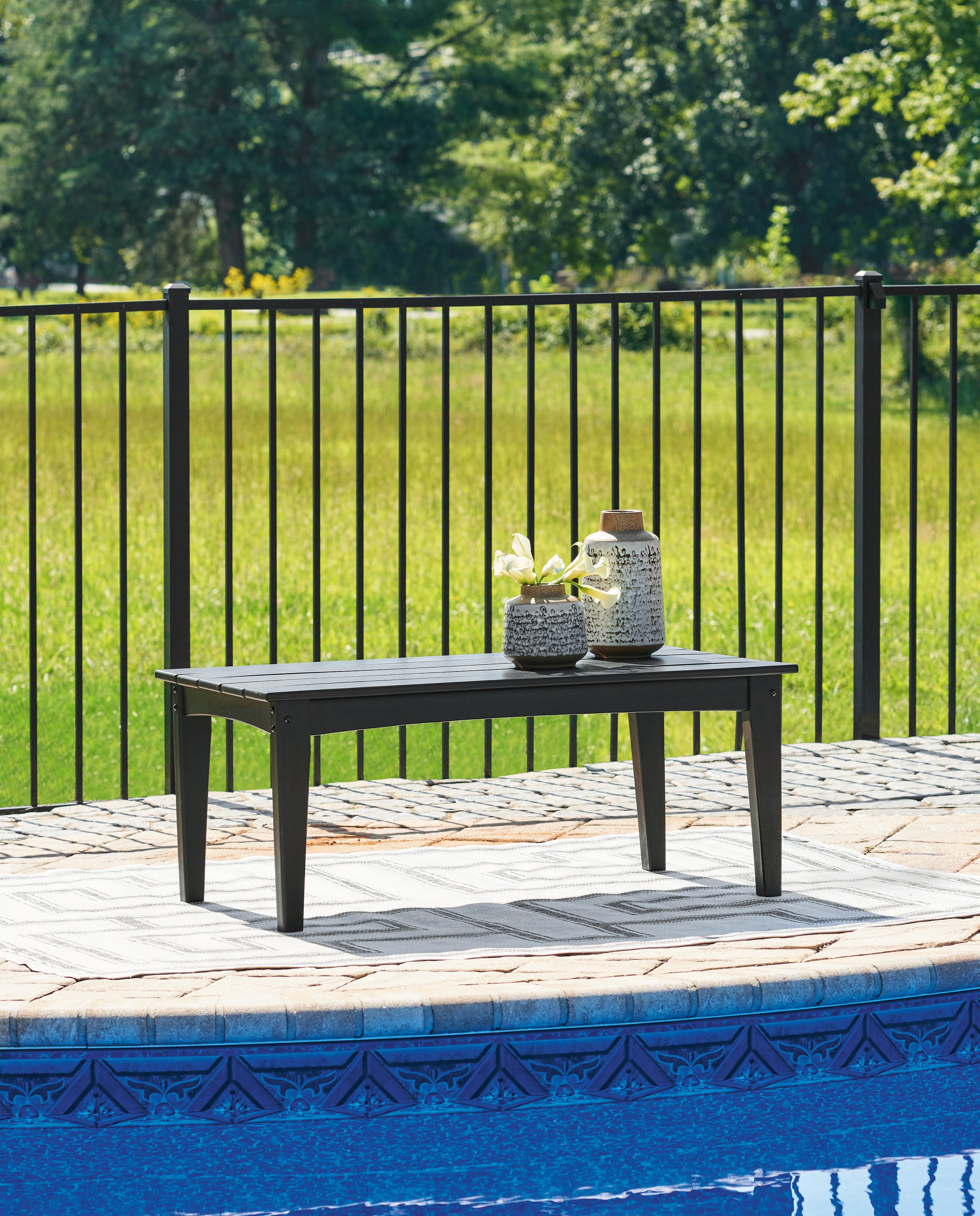 Tampa Furniture Outlet Lutz - Ashley Furniture - Hyland wave Outdoor - Rectangular Cocktail Table / Black - P108-701