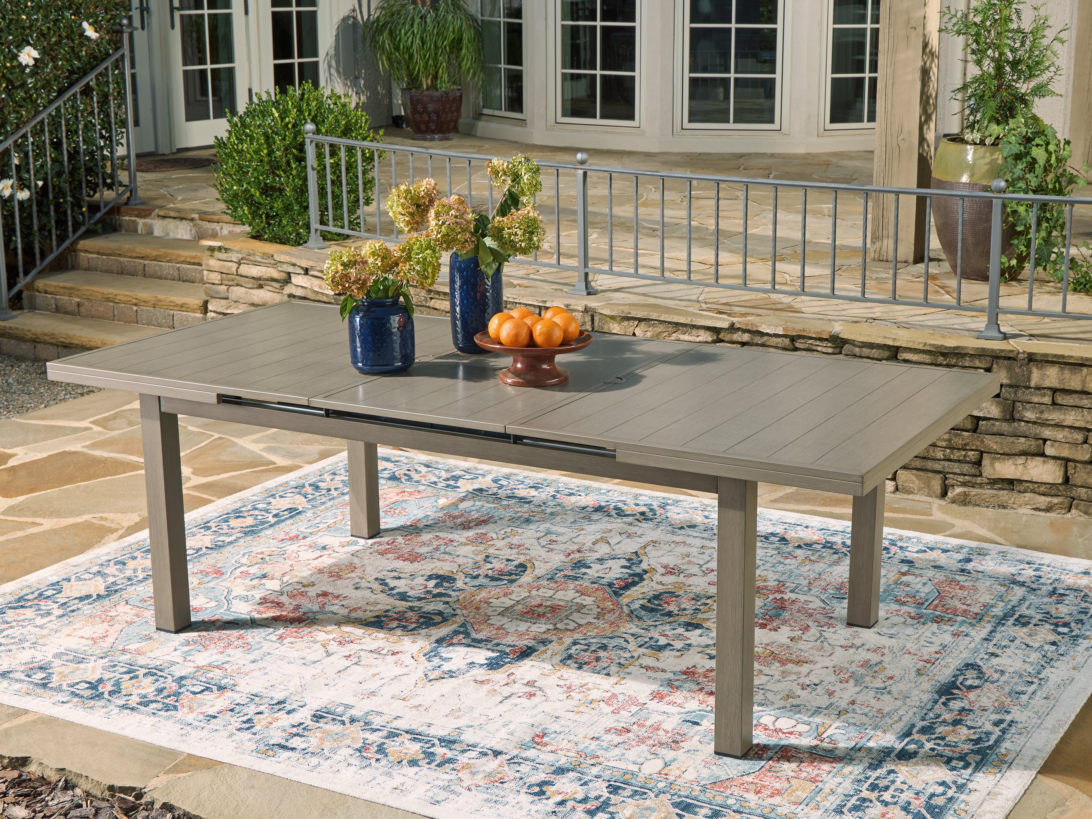 Tampa Furniture Outlet Lutz - Ashley Furniture - Beach Front Outdoor - RECT Dining Room EXT Table / Beige - P323-635