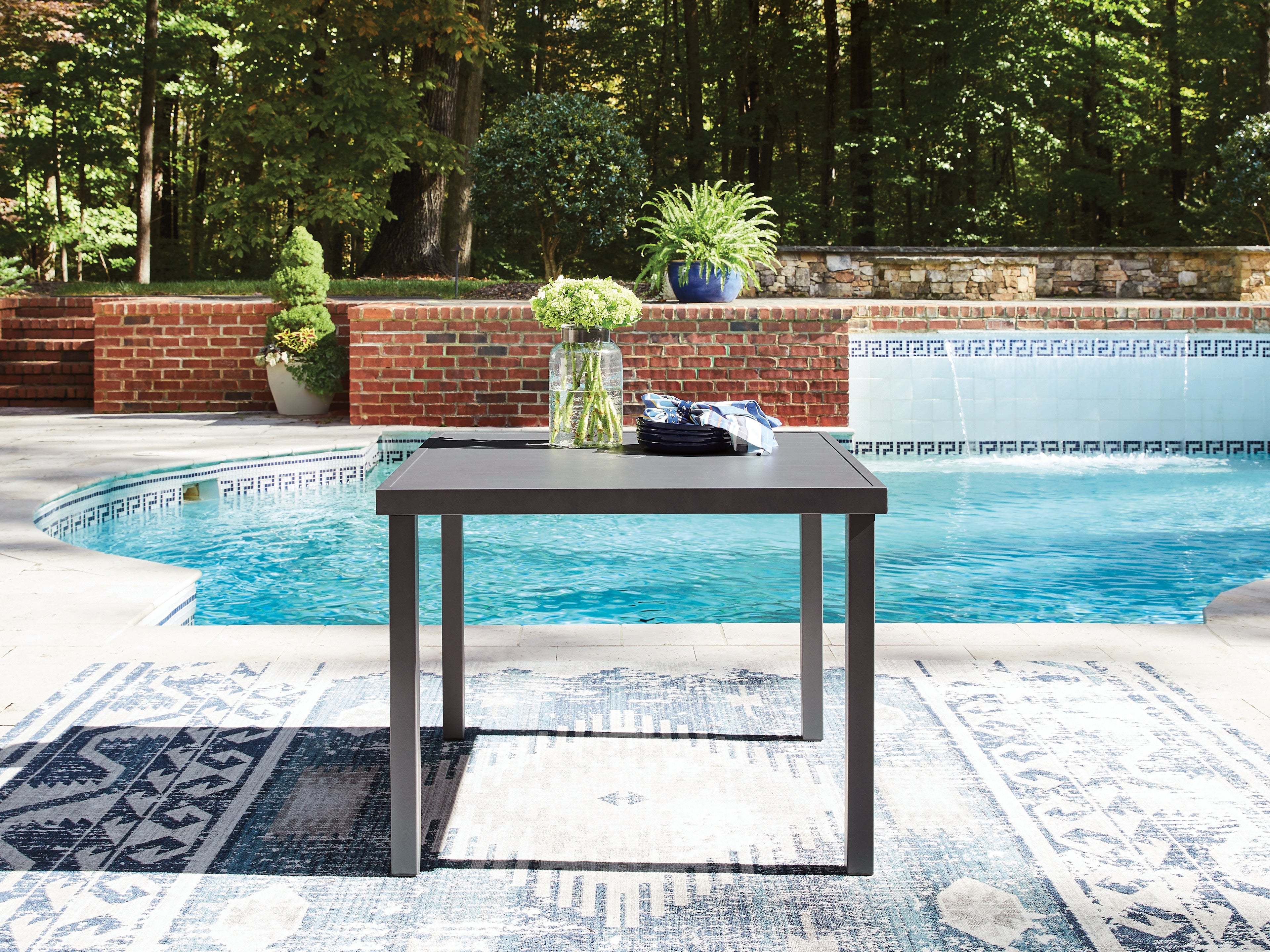 Tampa Furniture Outlet Lutz - Ashley Furniture - Rocky Creek Outdoor - Square Dining Table w/UMB OPT / Gray - PCP326-615