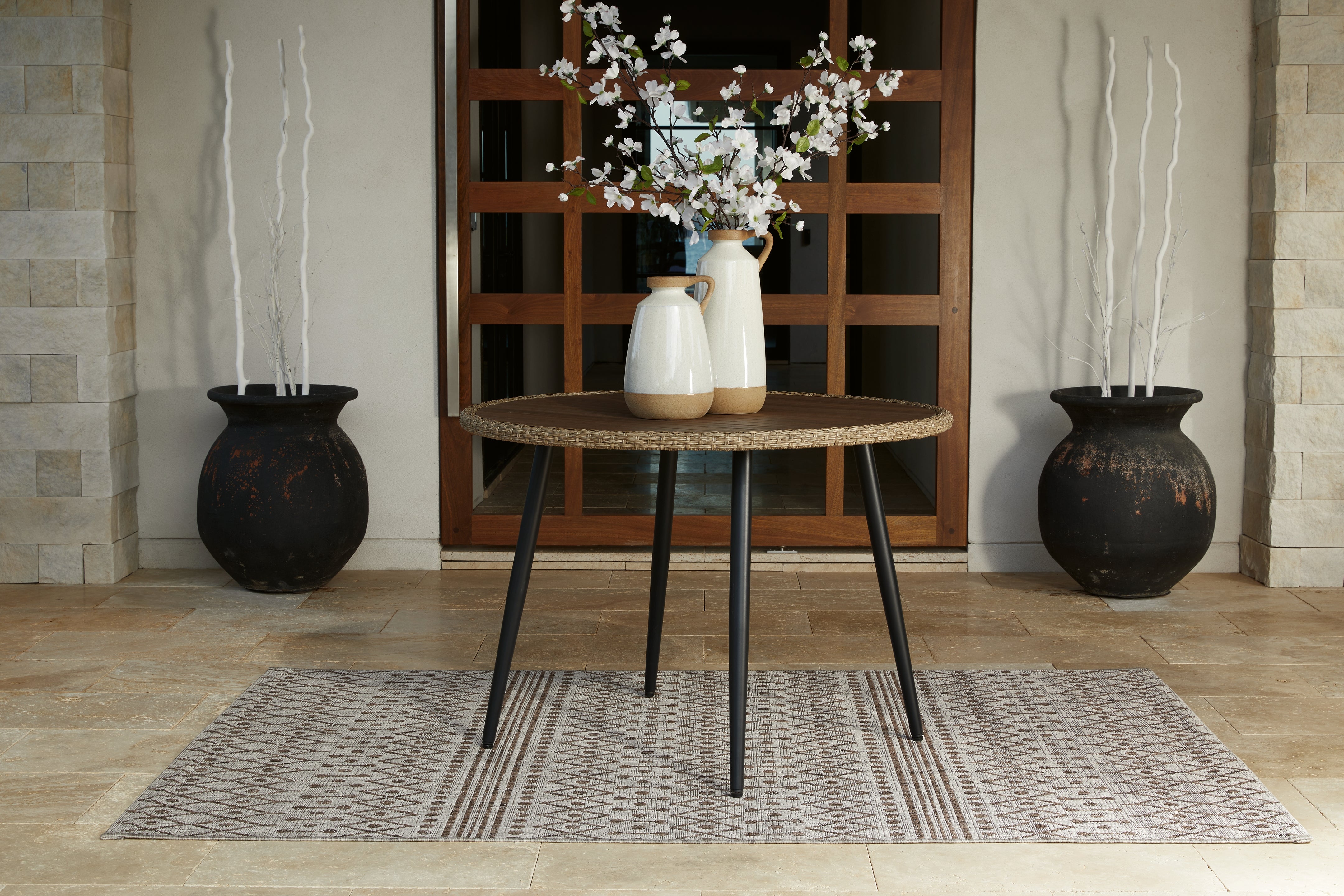 Tampa Furniture Outlet Lutz - Ashley Furniture - Amaris Outdoor - Round Dining Table / Brown/Black - P369-615