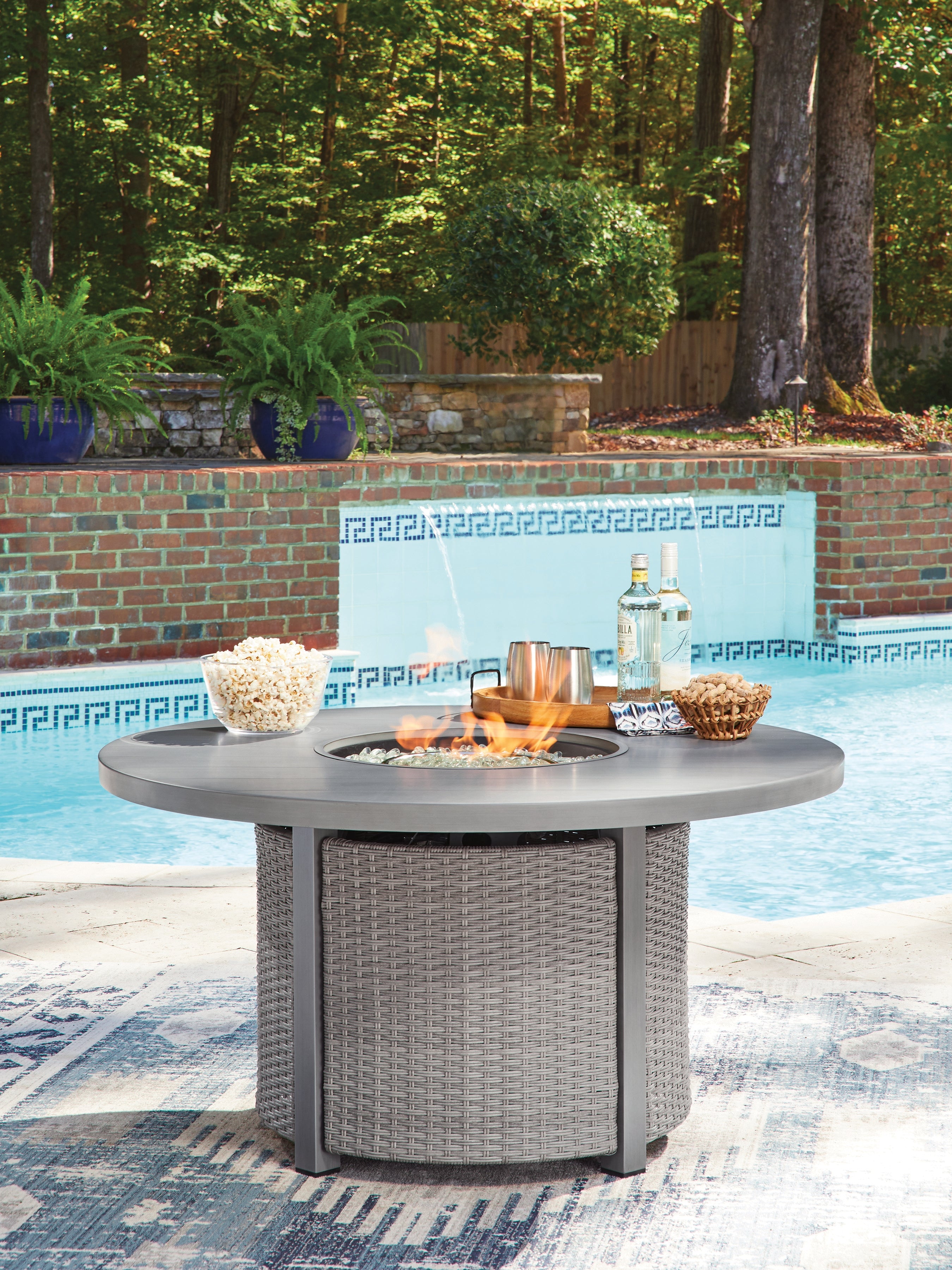 Tampa Furniture Outlet Lutz - Ashley Furniture - Half Moon Beach Outdoor - Round Fire Pit Table / Gray - PCP418-776