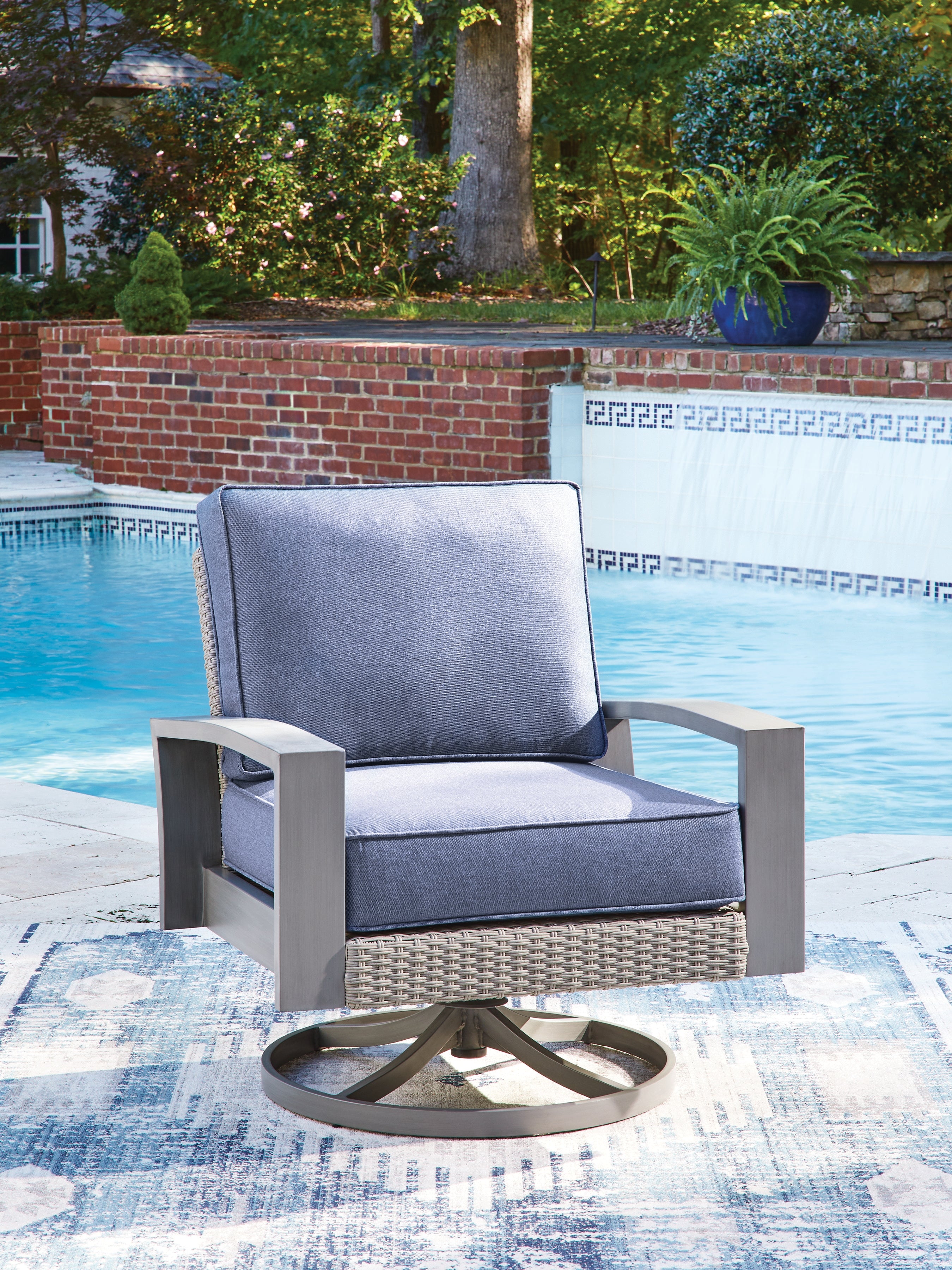 Tampa Furniture Outlet Lutz - Ashley Furniture - Half Moon Beach Outdoor - Swivel Lounge w/ Cushion / Blue/Gray - PCP418-821