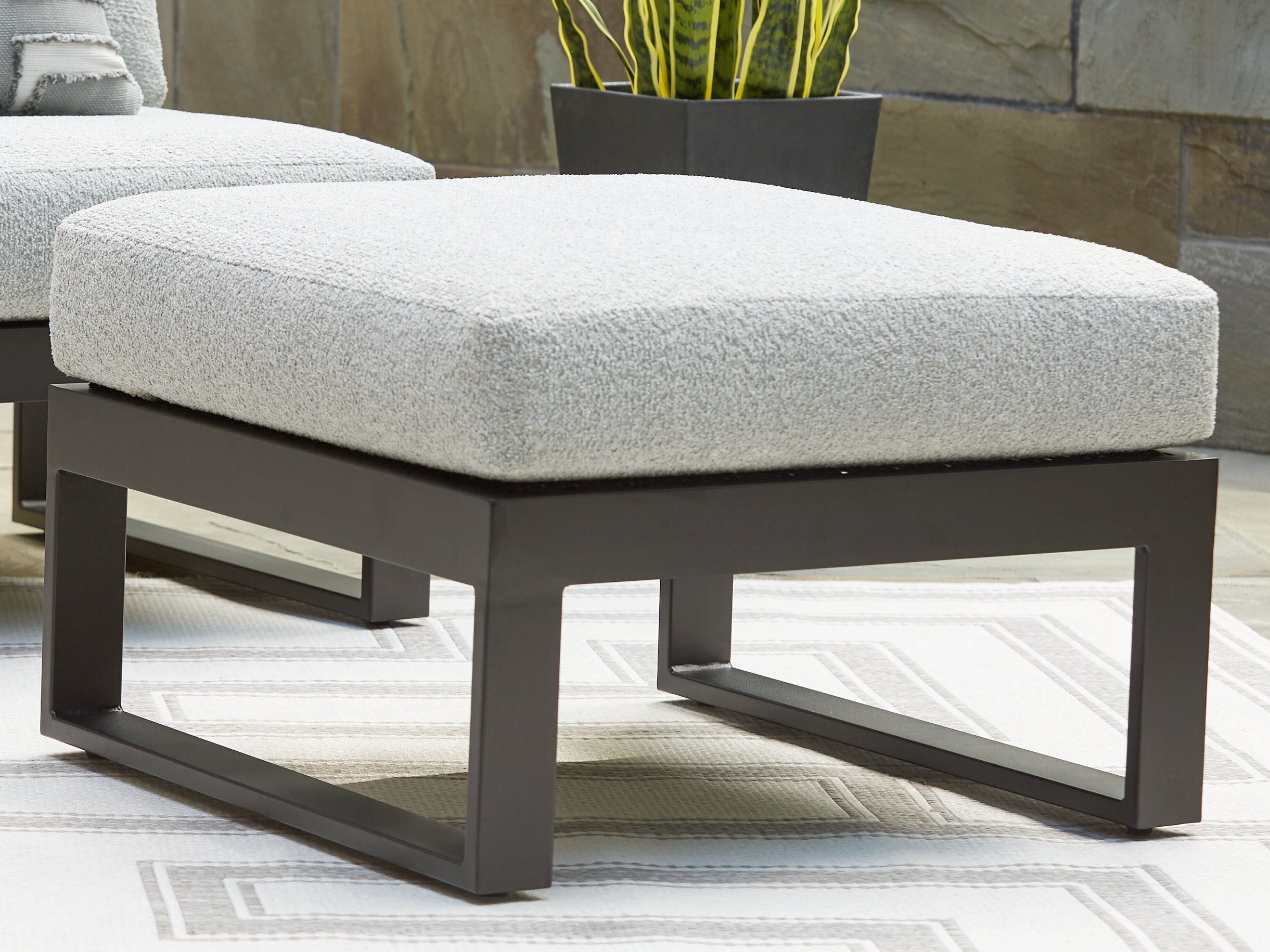 Tampa Furniture Outlet Lutz - Ashley Furniture - Beachloft Outdoor - Ottoman with Cushion / Black/Gray - P490-814