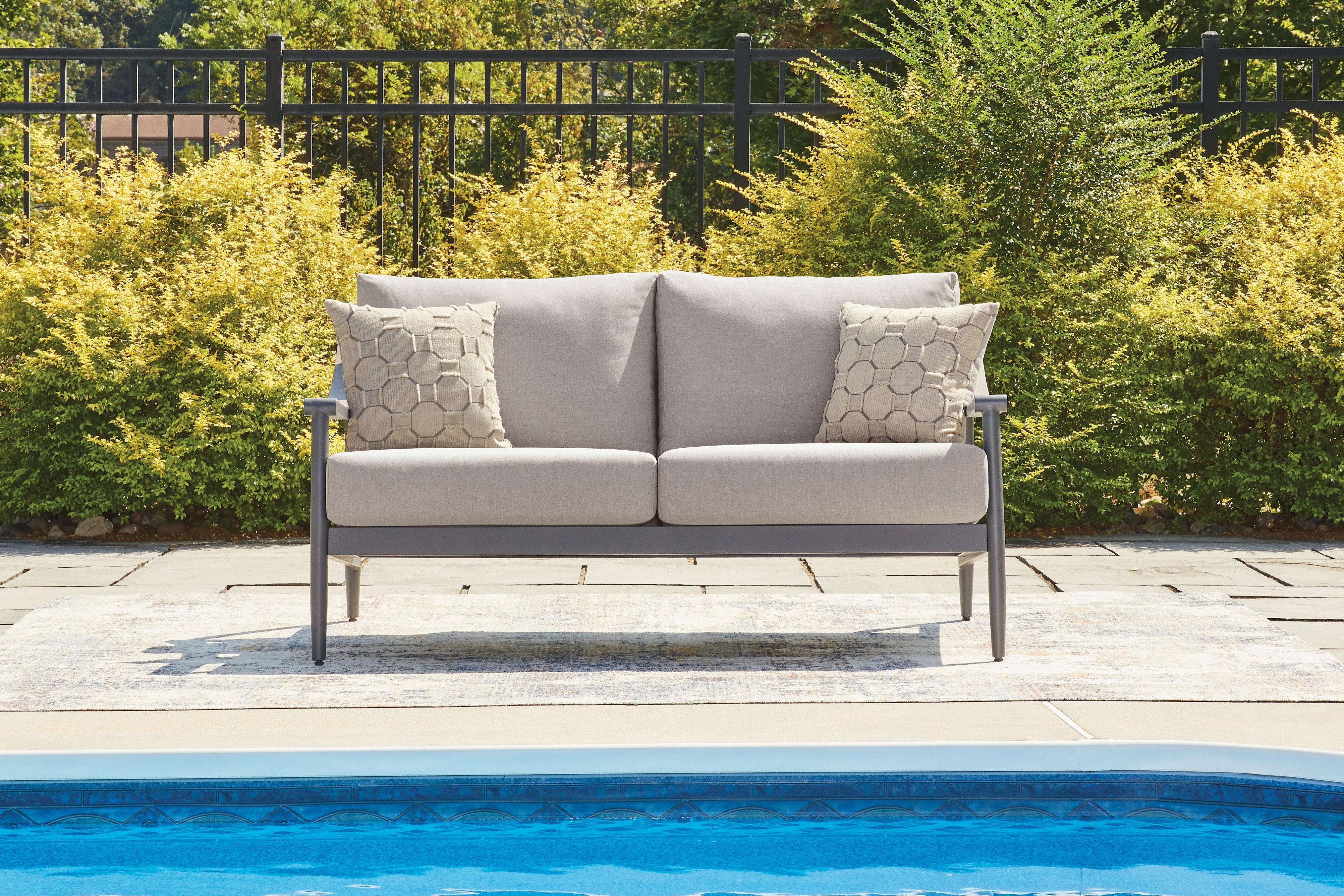 Tampa Furniture Outlet Lutz - Ashley Furniture - Ocean Beach Outdoor - Loveseat w/Cushion / Gray - PCP510-835