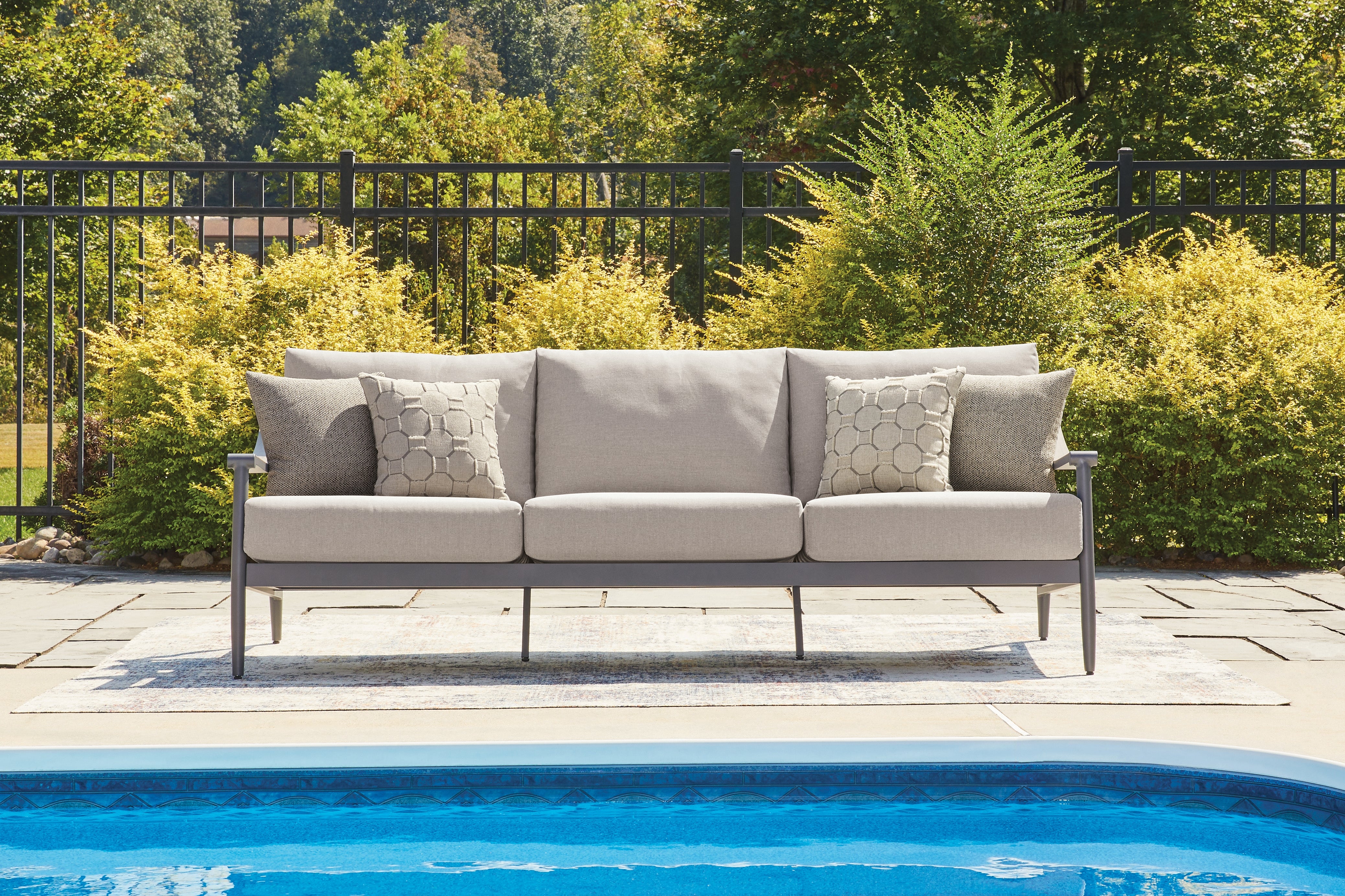 Tampa Furniture Outlet Lutz - Ashley Furniture - Ocean Beach Outdoor - Sofa with Cushion / Gray - PCP510-838