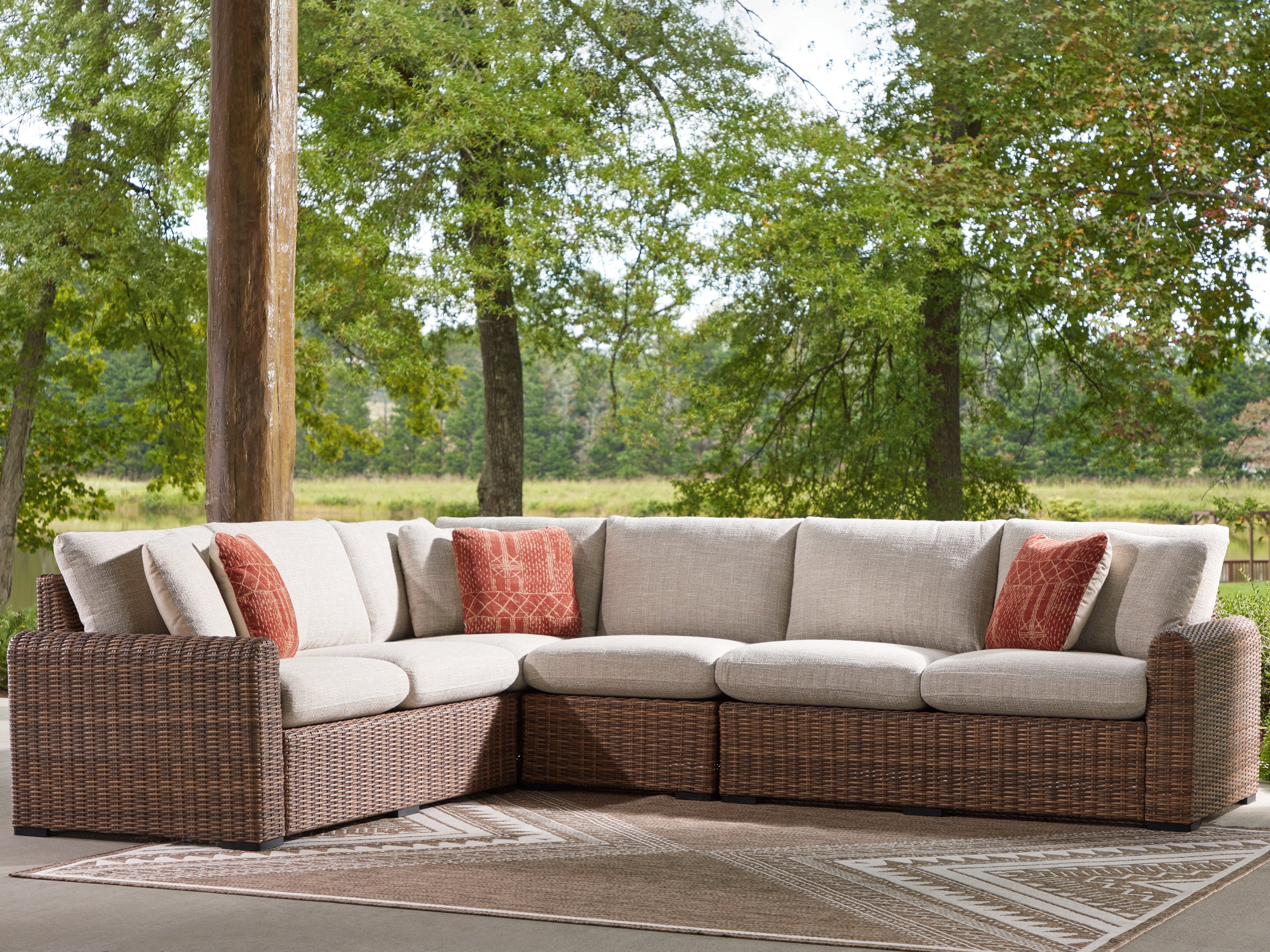 Tampa Furniture Outlet Lutz - Ashley Furniture - Dolan Creek Outdoor - 4-Piece Outdoor Sectional / Beige/Brown - PCP610P2