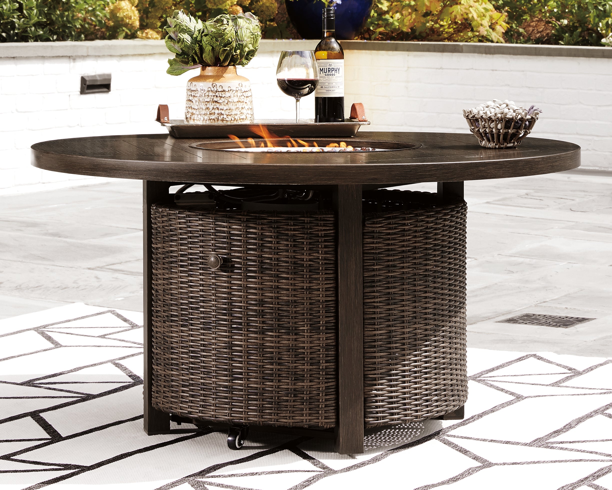 Tampa Furniture Outlet Lutz - Ashley Furniture - Paradise Trail Outdoor - Round Fire Pit Table / Medium Brown - P750-776