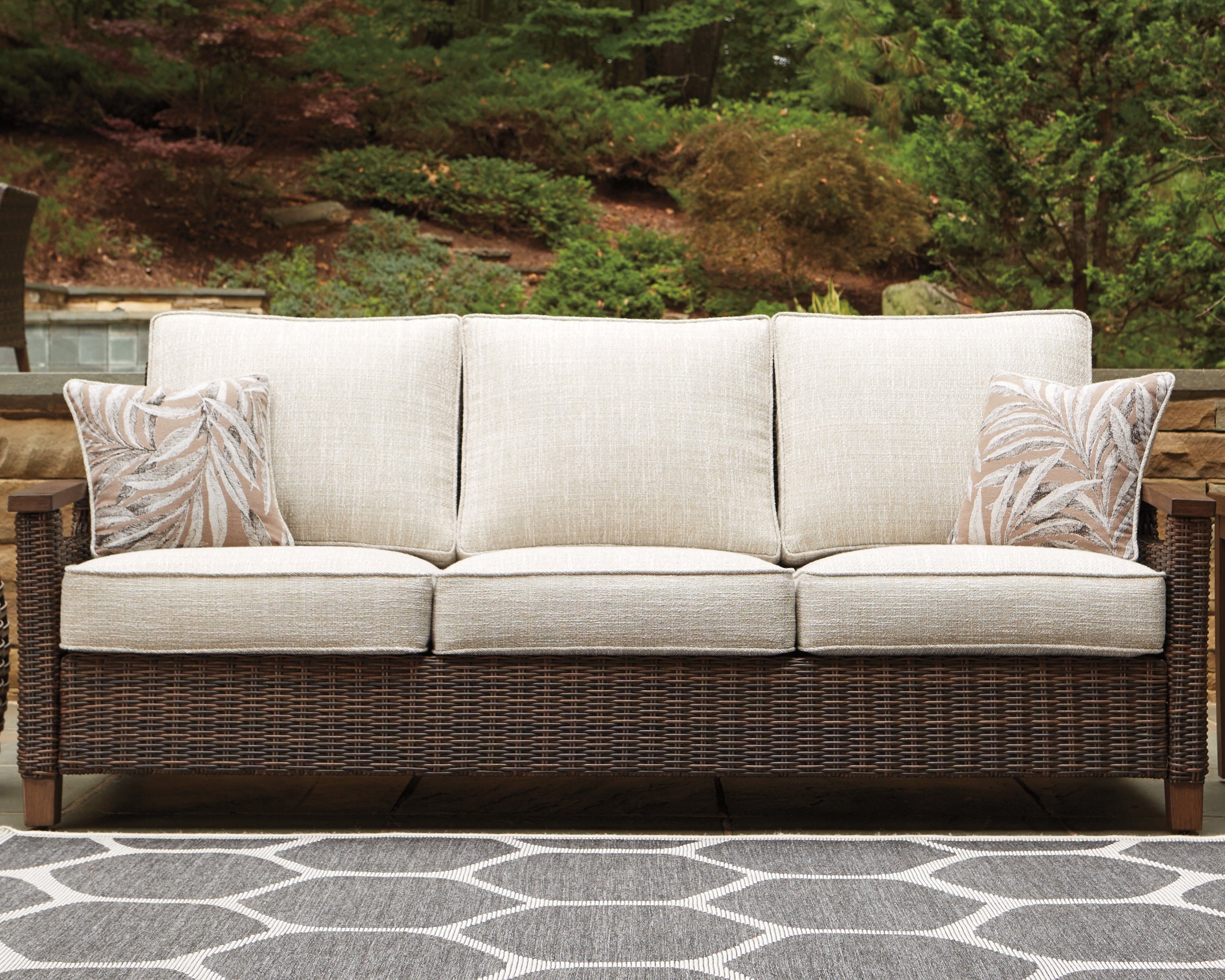 Tampa Furniture Outlet Lutz - Ashley Furniture - Paradise Trail Outdoor - Sofa with Cushion / Medium Brown - P750-838