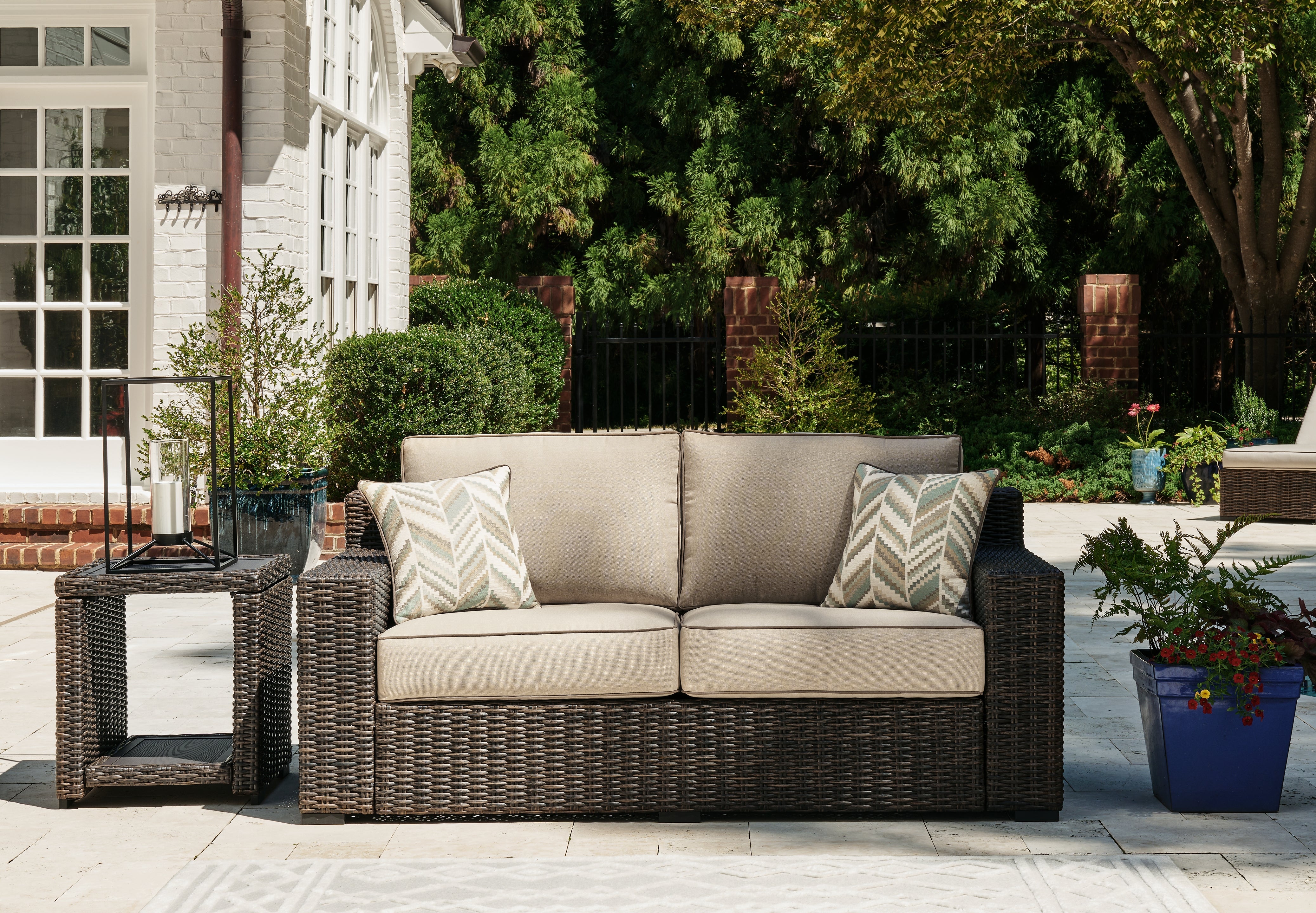 Tampa Furniture Outlet Lutz - Ashley Furniture - Coastline Bay Outdoor - Loveseat w/Cushion / Brown - P784-835