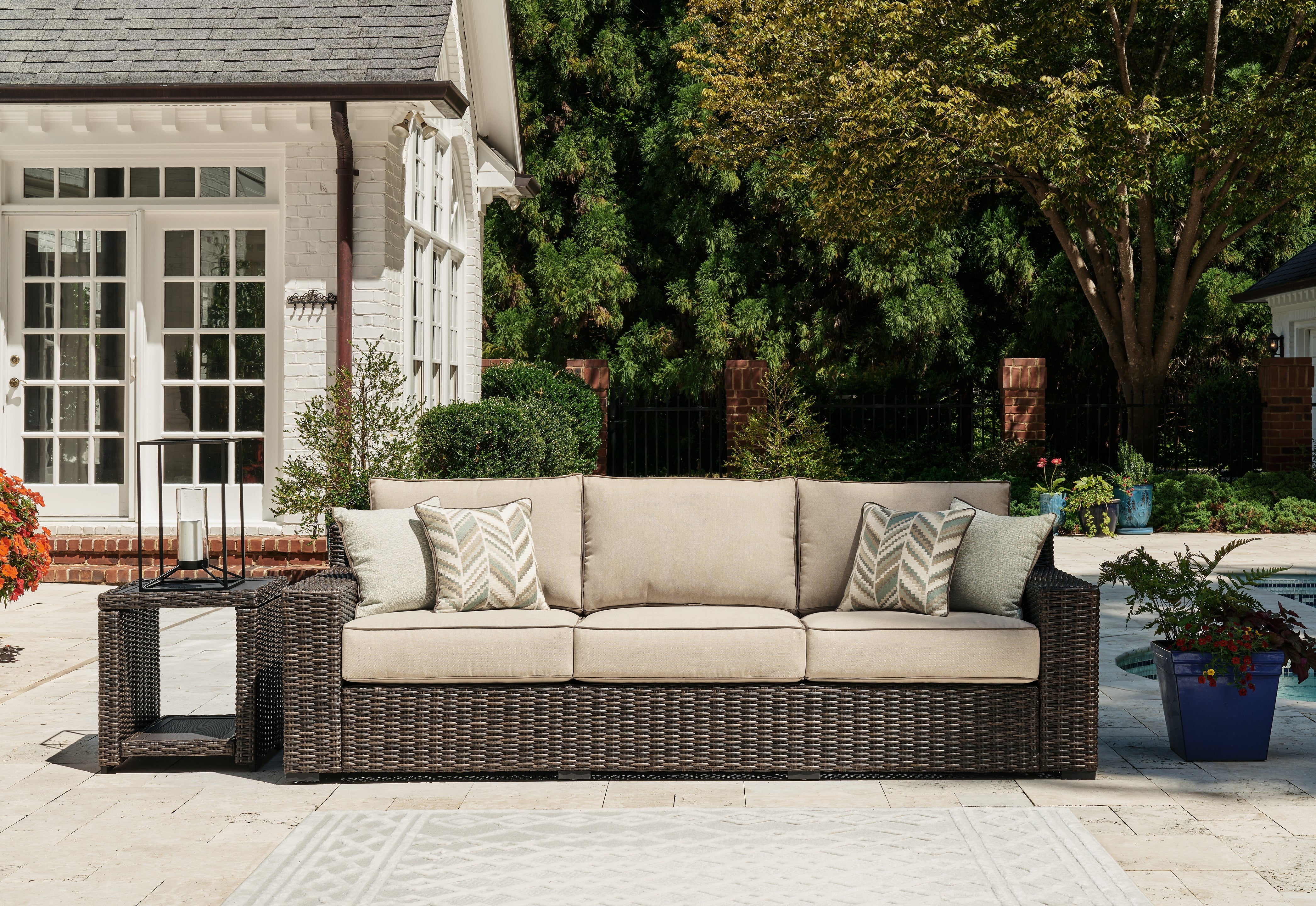 Tampa Furniture Outlet Lutz - Ashley Furniture - Coastline Bay Outdoor - Sofa with Cushion / Brown - P784-838