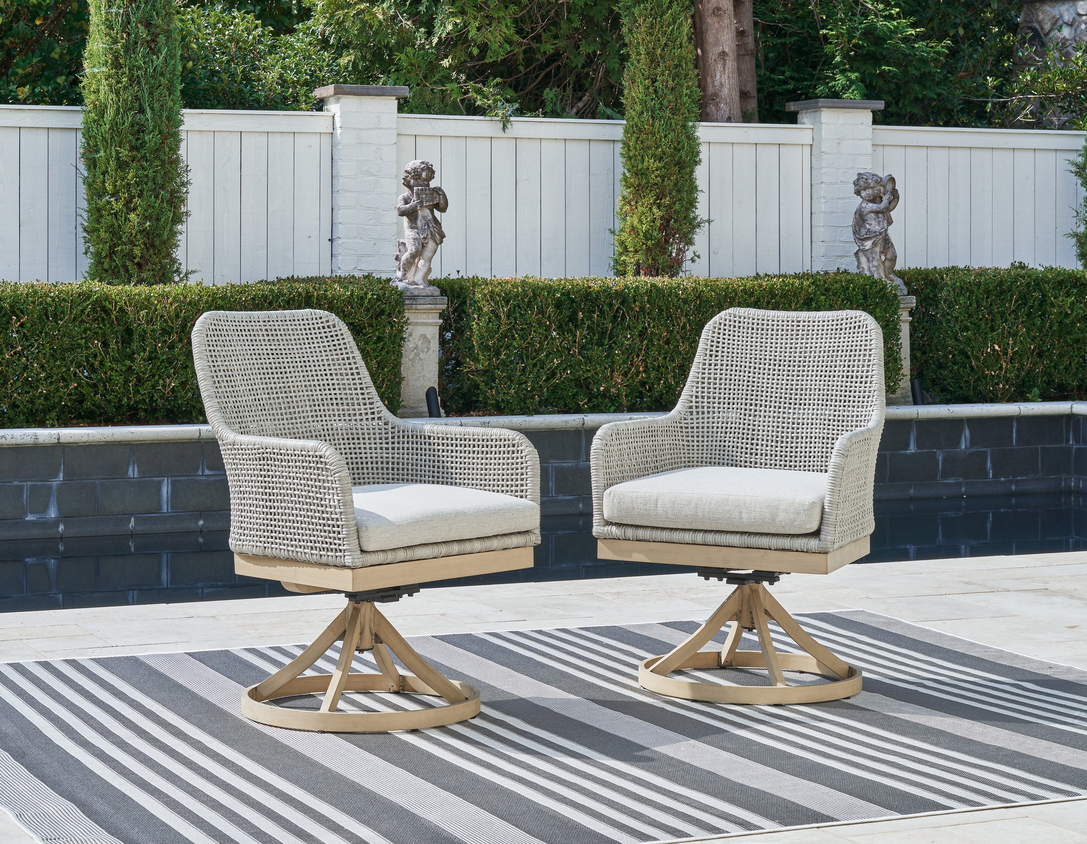 Tampa Furniture Outlet Lutz - Ashley Furniture - Seton Creek Outdoor - Swivel Chair w/Cushion (Set of 2) / Gray - P798-602A