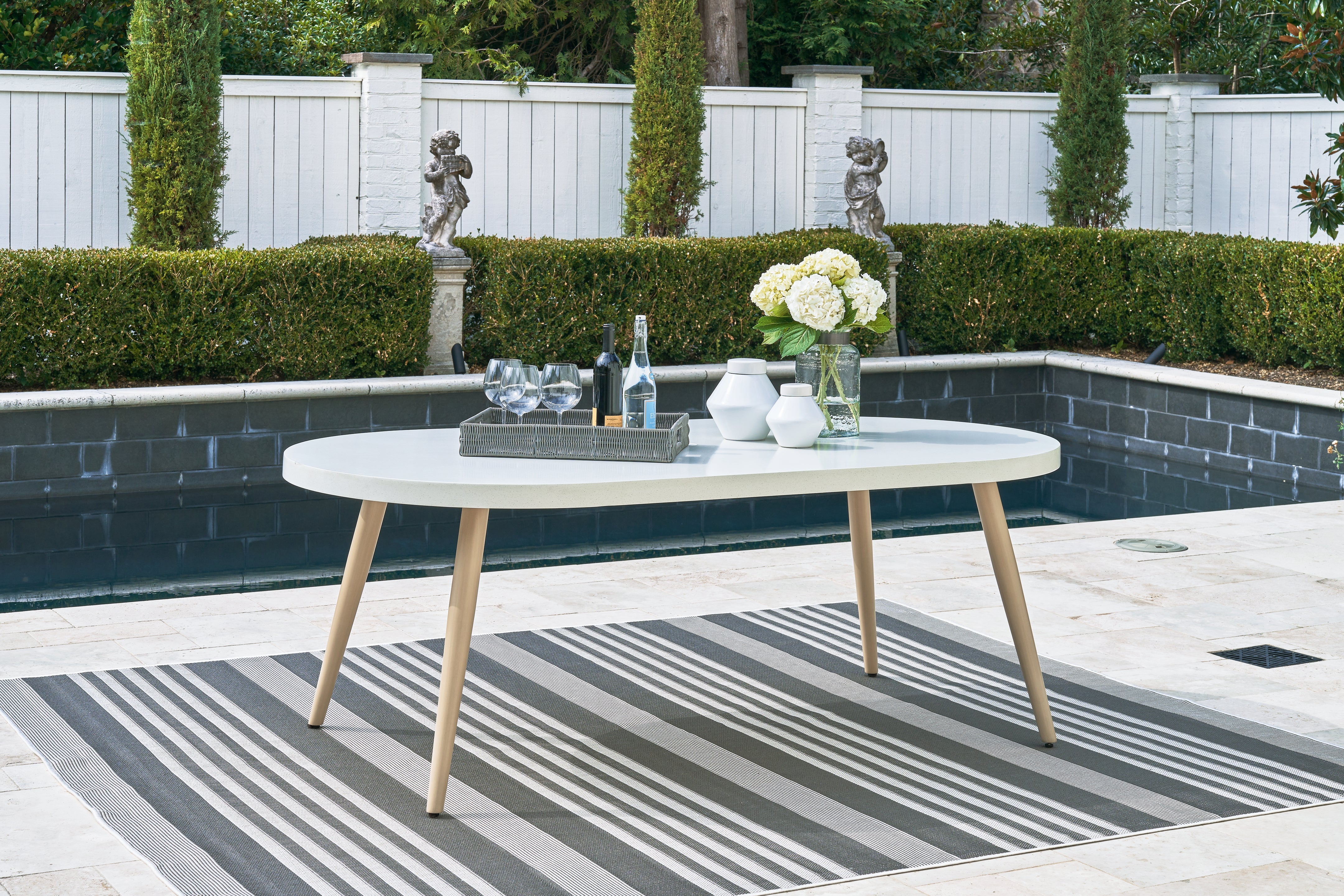 Tampa Furniture Outlet Lutz - Ashley Furniture - Seton Creek Outdoor - Oval Dining Table w/UMB OPT / White - P798-625