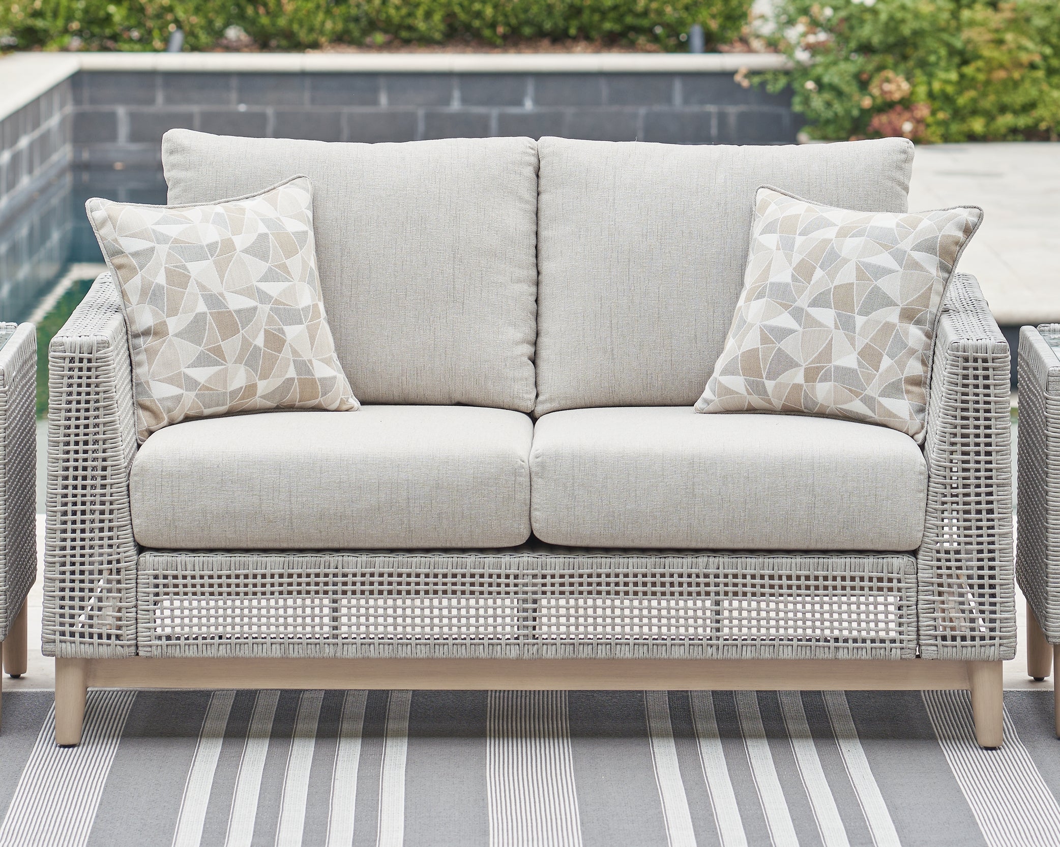 Tampa Furniture Outlet Lutz - Ashley Furniture - Seton Creek Outdoor - Loveseat w/Cushion / Gray - P798-835