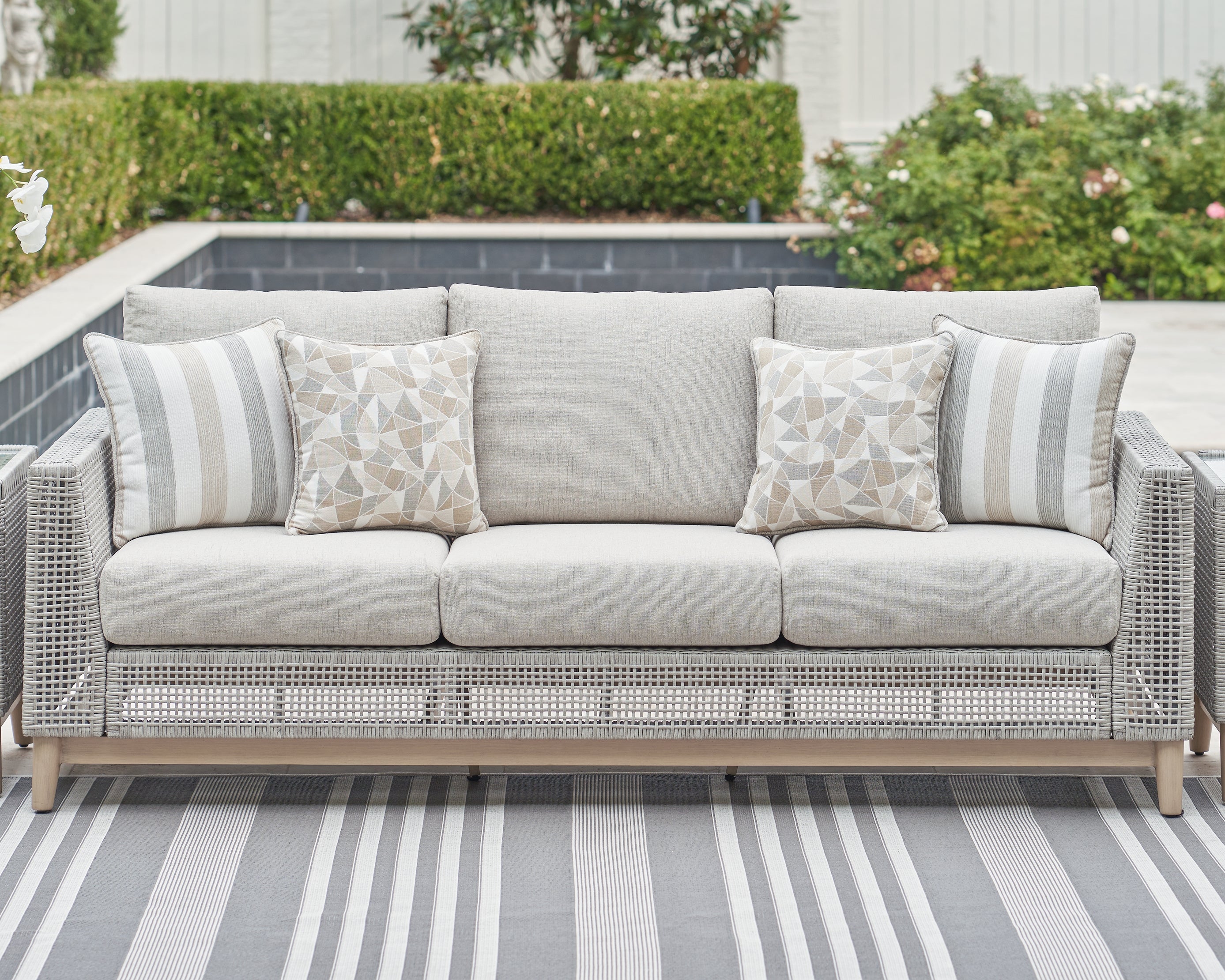 Tampa Furniture Outlet Lutz - Ashley Furniture - Seton Creek Outdoor - Sofa with Cushion / Gray - P798-838