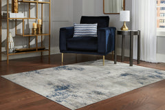 Tampa Furniture Outlet Lutz - Ashley Furniture - Wrenstow Rug - 5'3" x 7'3" Rug / Multi - R403752