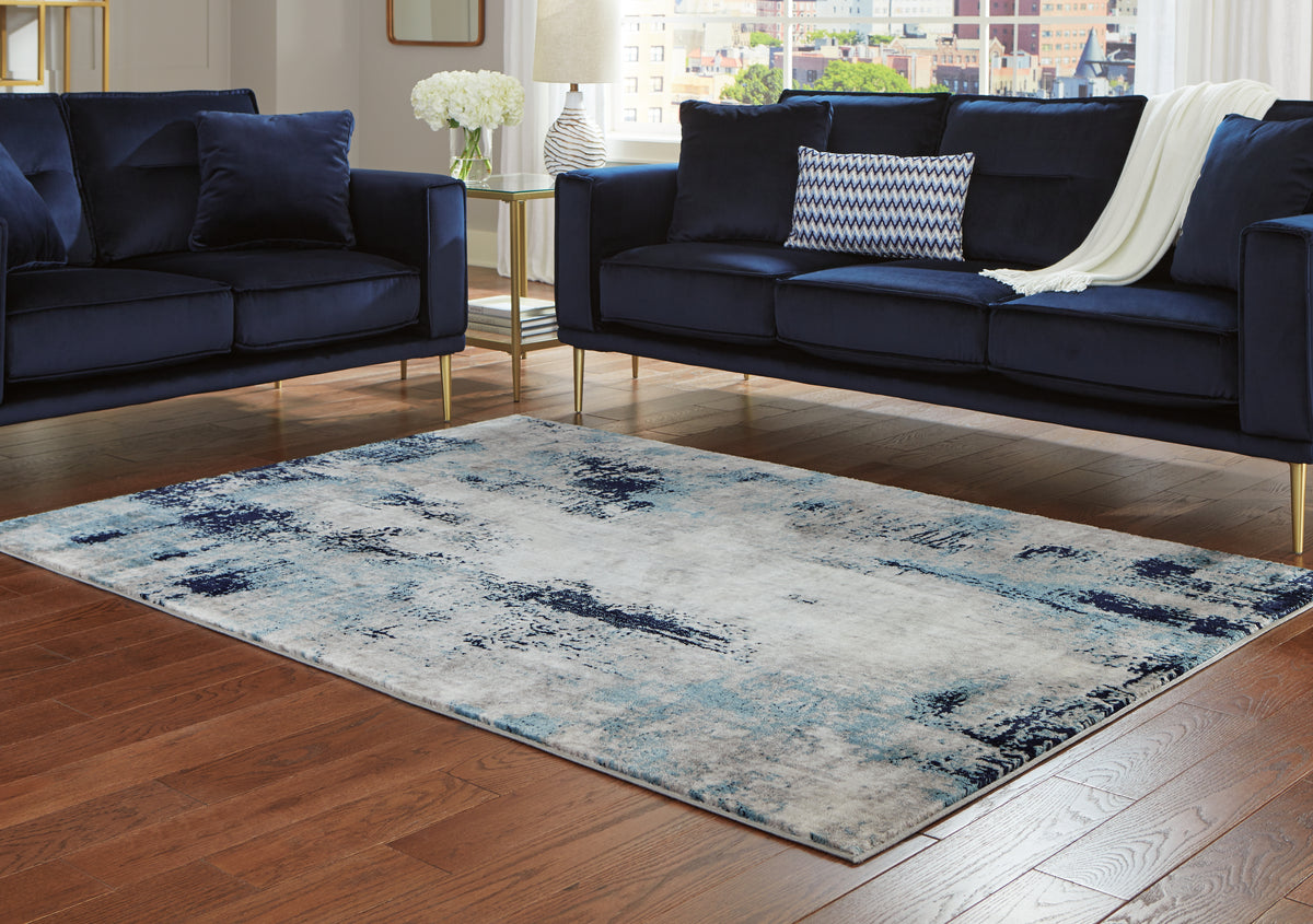Tampa Furniture Outlet Lutz - Ashley Furniture - Leonelle Rug - 7'10" x 10' Rug / White/Blue/Gray - R404871
