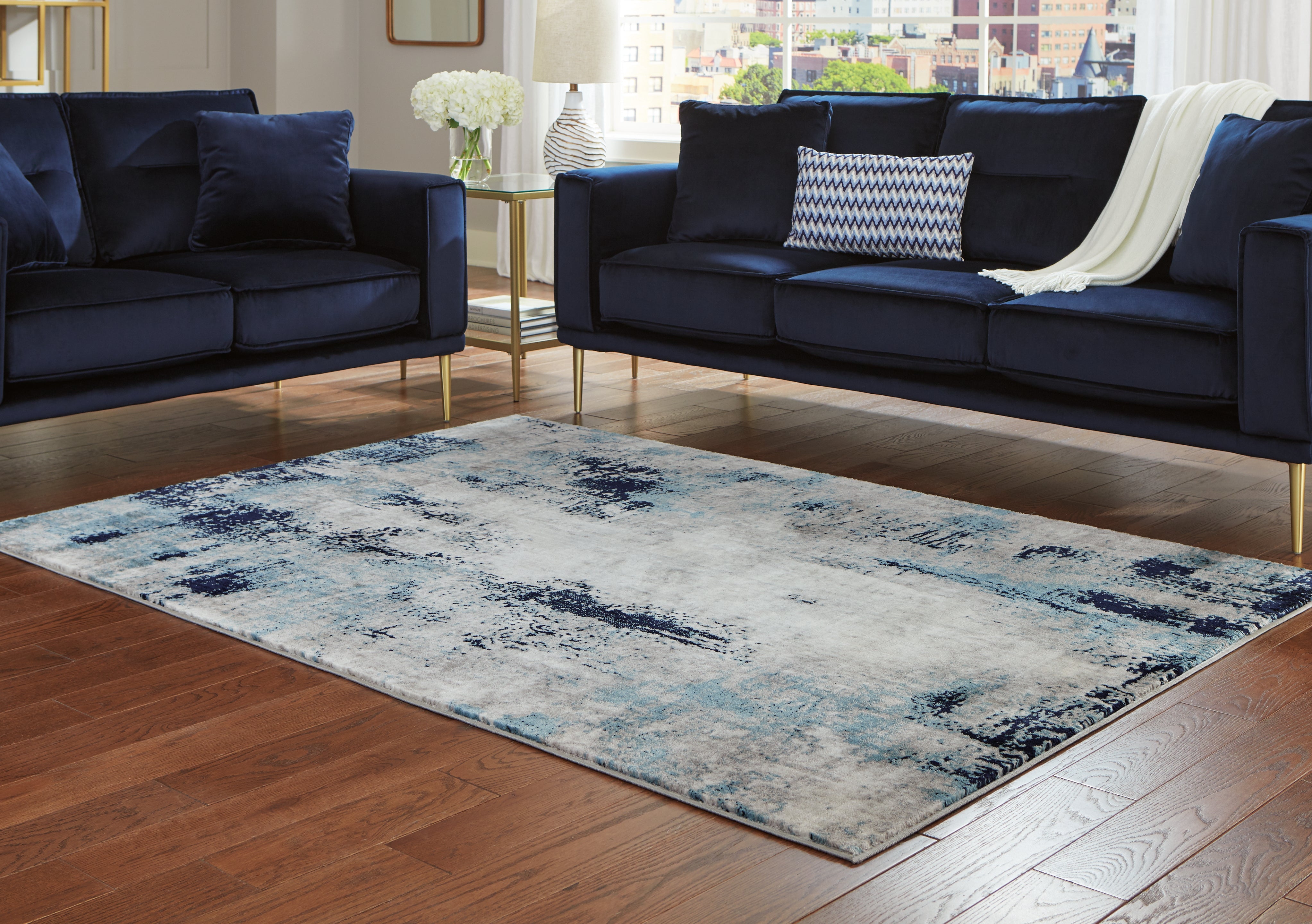 Tampa Furniture Outlet Lutz - Ashley Furniture - Leonelle Rug - 5'3" x 7'3" Rug / Cream/Blue/Gray - R404872