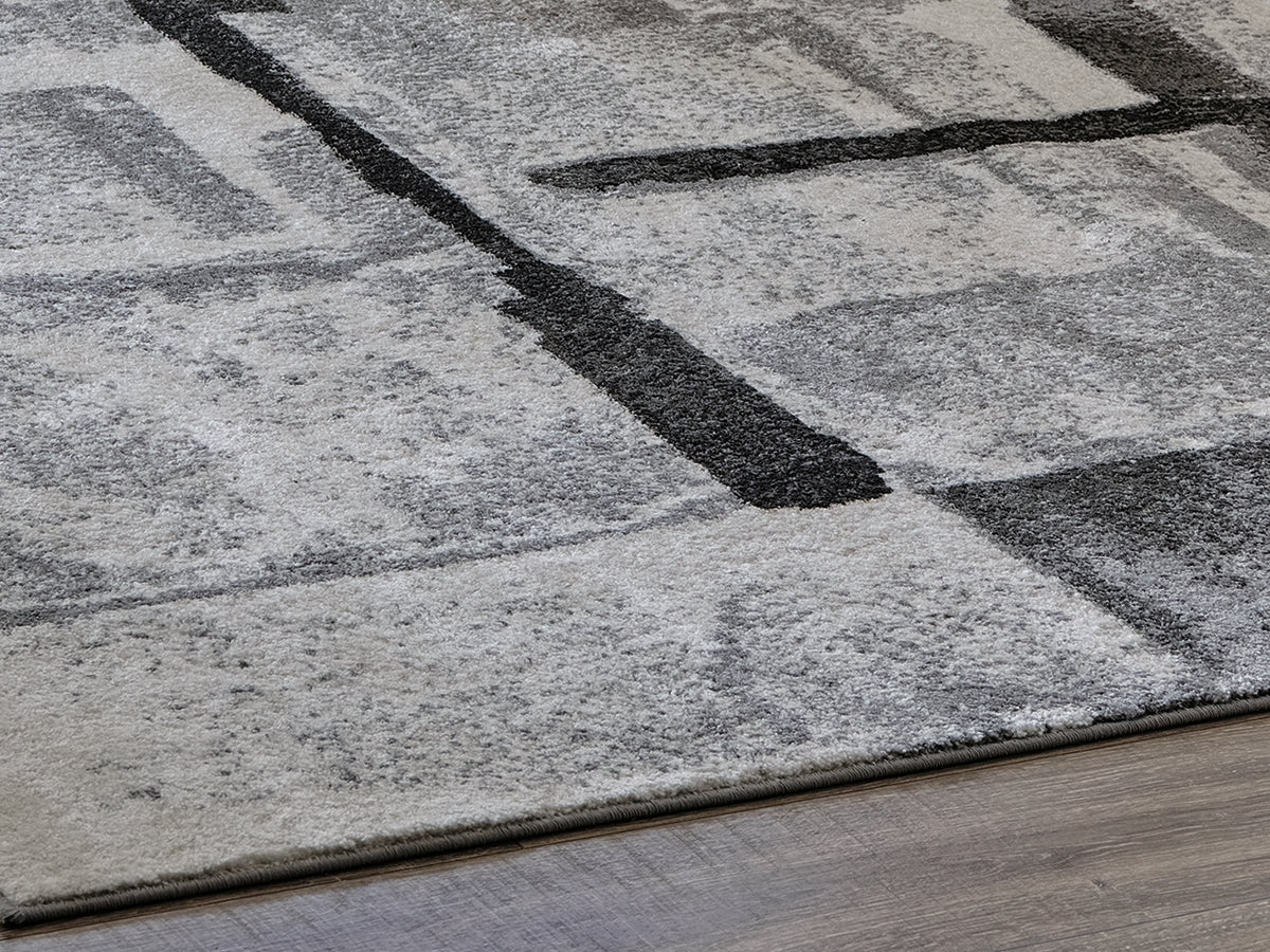 Tampa Furniture Outlet Lutz - Ashley Furniture - Brycebourne Rug - 5'3" x 7'7" Rug / Black/Cream/Gray - R404982