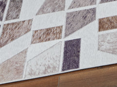 Tampa Furniture Outlet Lutz - Ashley Furniture - Jettner Rug - 7'10" x 10' Rug / Multi - R405781