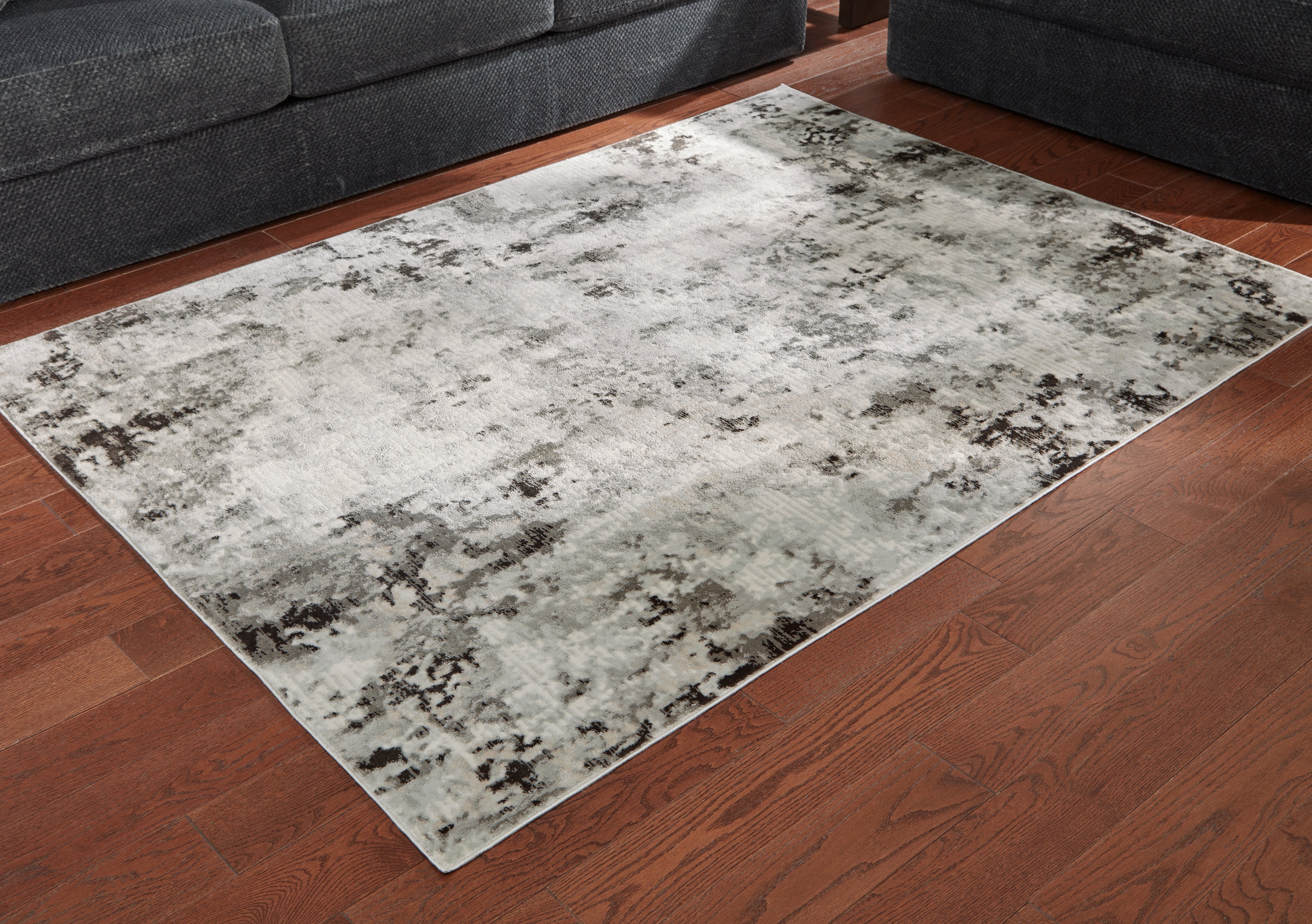 Tampa Furniture Outlet Lutz - Ashley Furniture - Greyland Rug - 5' x 7' Rug / Multi - R405972