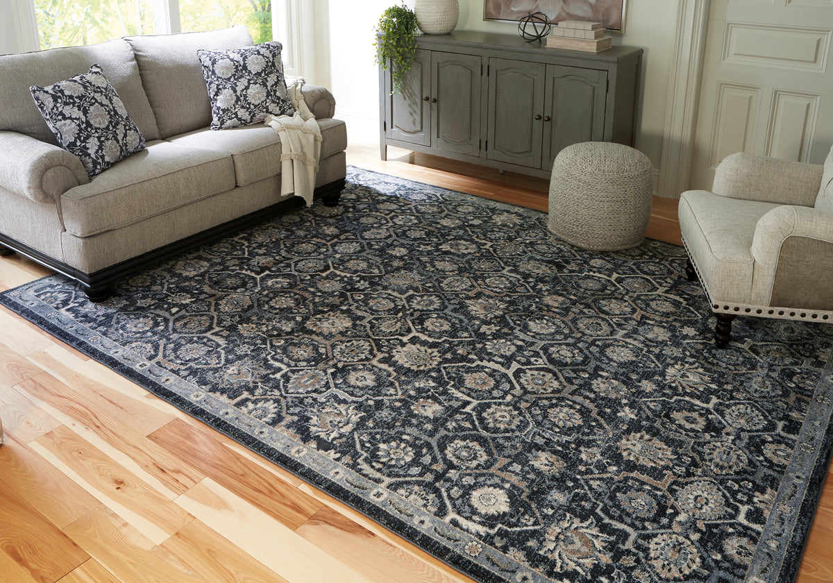 Tampa Furniture Outlet Lutz - Ashley Furniture - Hilcott Rug - 7'10" x 10'6" Rug / Blue/Cream/Brown - R406111