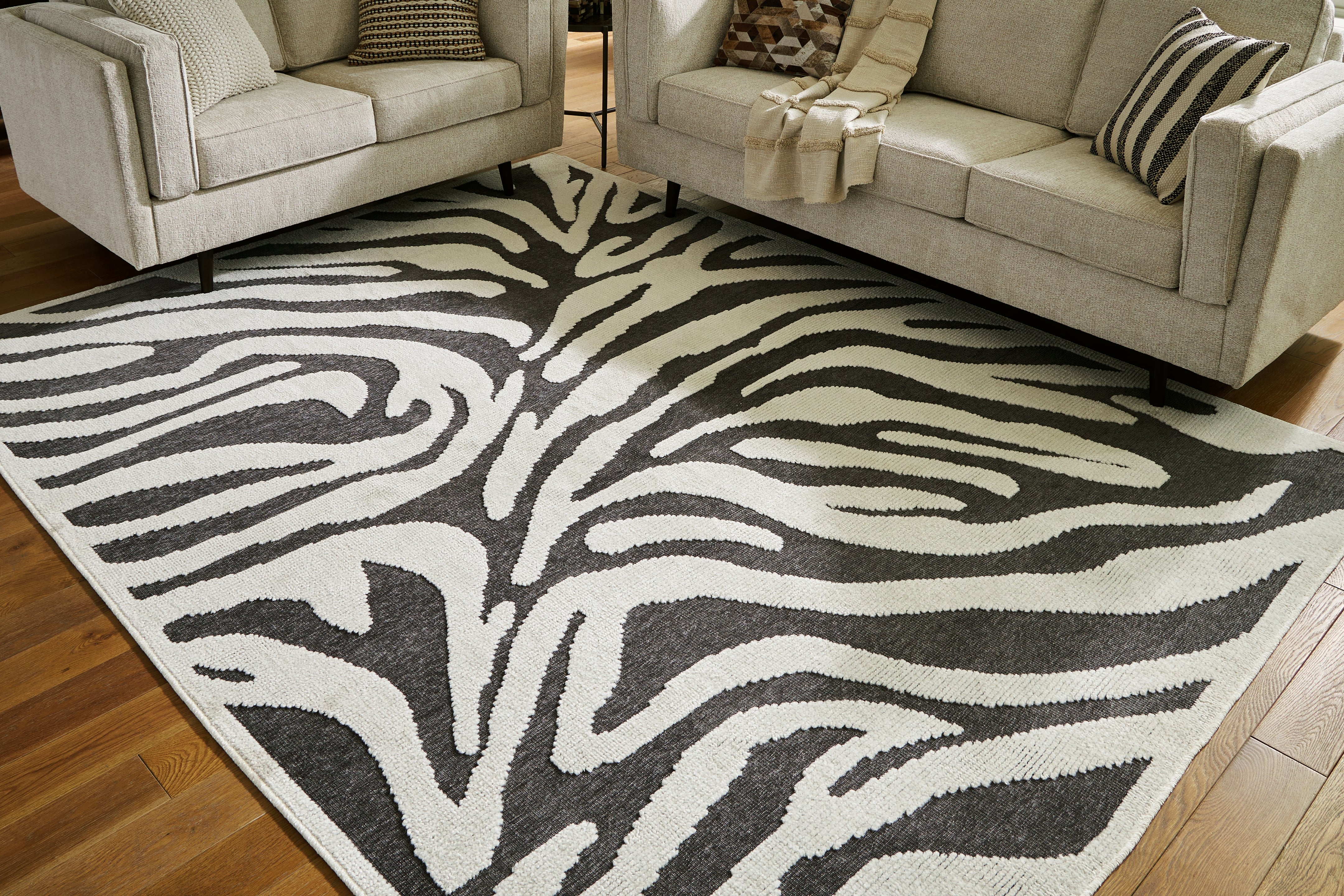 Tampa Furniture Outlet Lutz - Ashley Furniture - Thomwith Rug - 8' x 10'2" Washable Rug / Black/Ivory - R406291