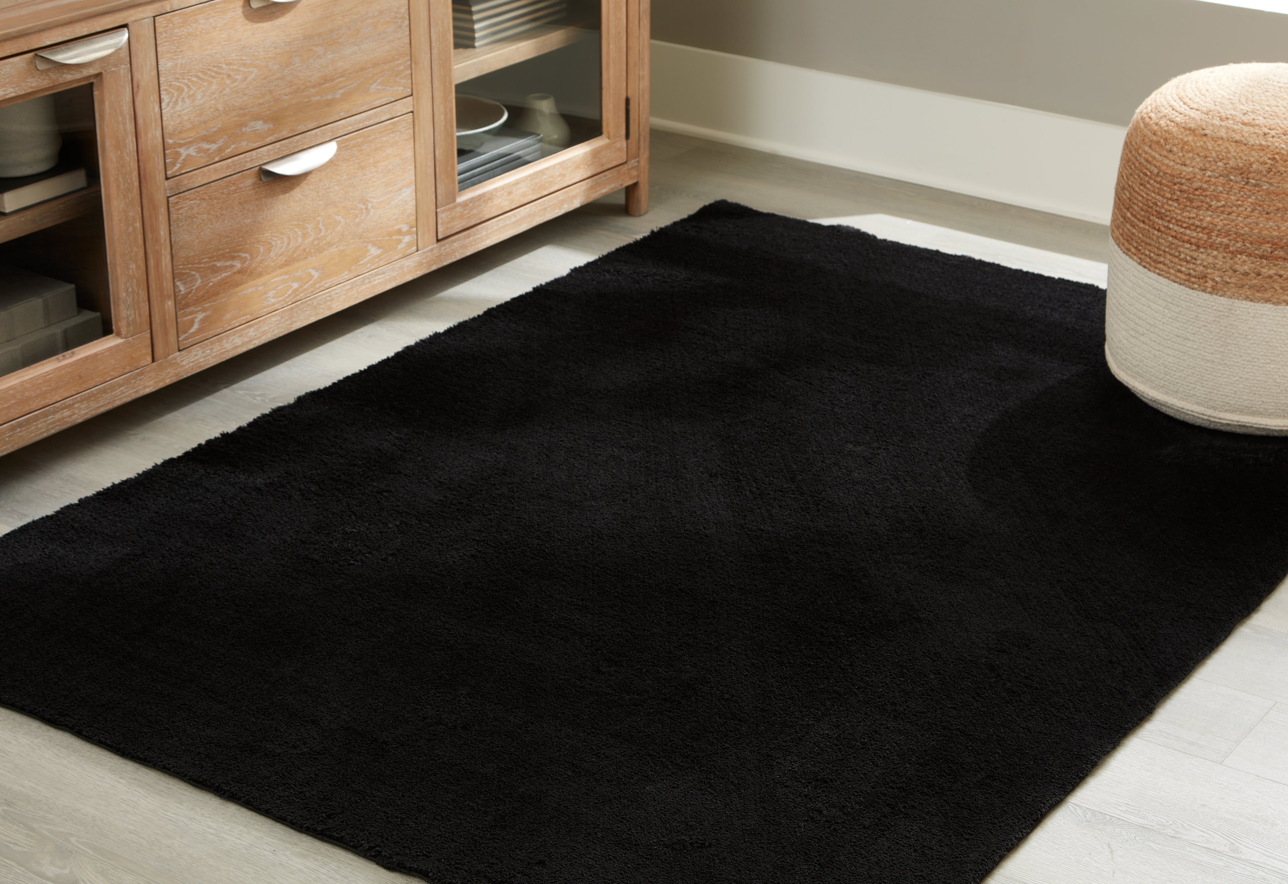 Tampa Furniture Outlet Lutz - Ashley Furniture - Anaben Rug - 8' x 10'1" Washable Rug / Black - R406311