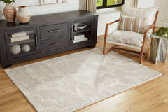 Tampa Furniture Outlet Lutz - Ashley Furniture - Chadess Rug - 5' x 7' Rug / Linen/Taupe - R406362