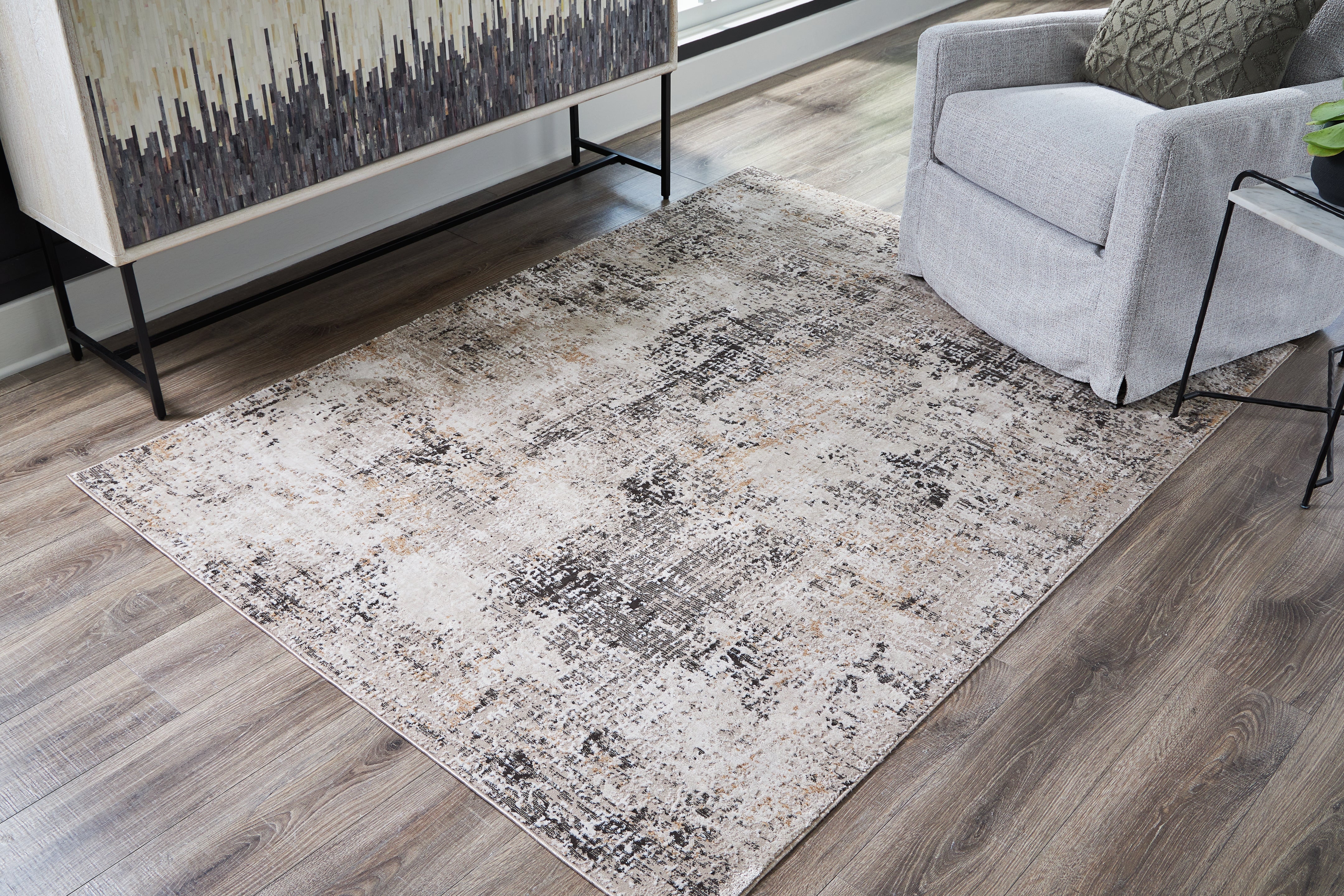Tampa Furniture Outlet Lutz - Ashley Furniture - Elaning Rug - 5' x 7' Rug / Black/Gray/Cream - R406702