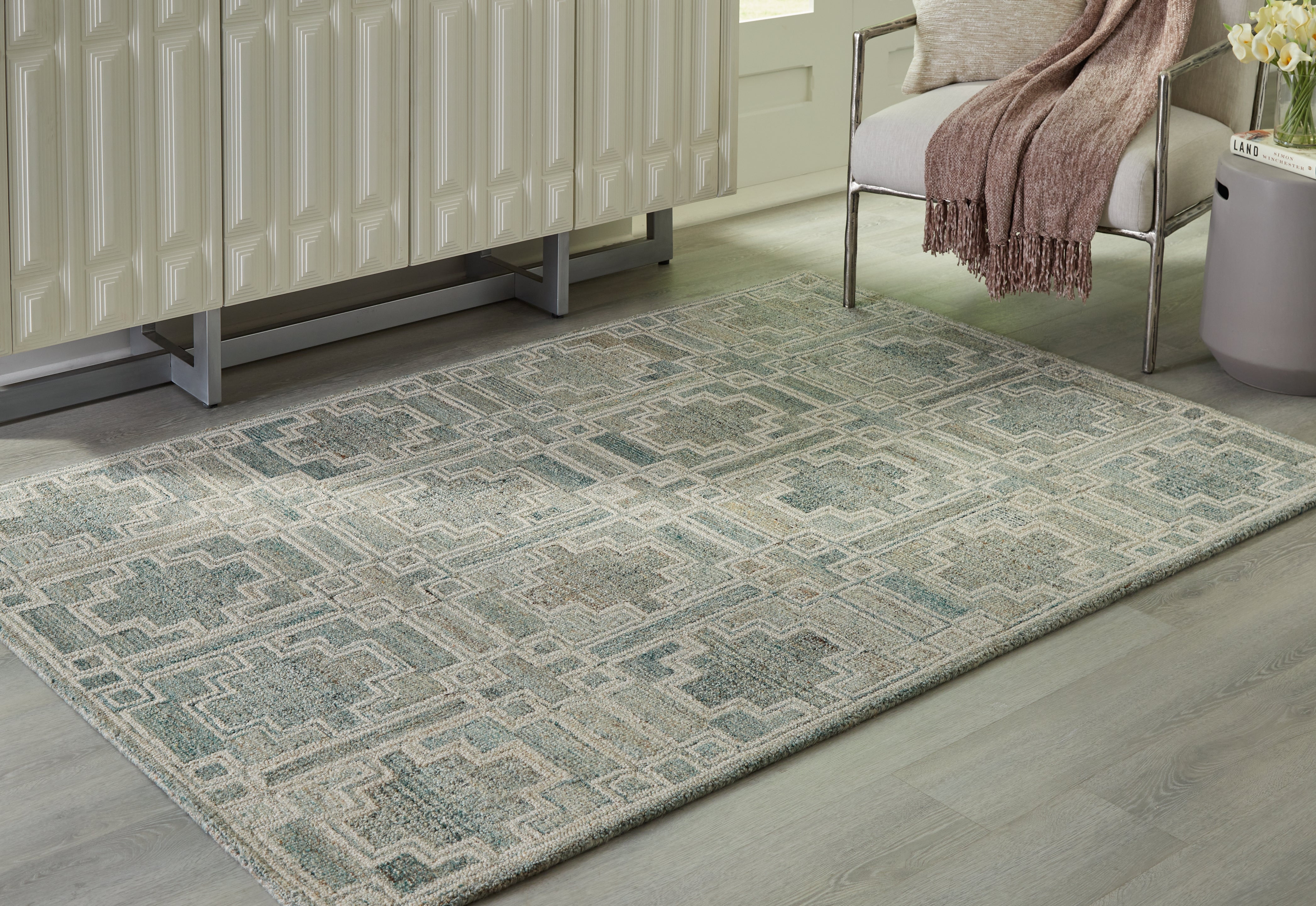 Tampa Furniture Outlet Lutz - Ashley Furniture - Jossland Rug - 5' x 7' Rug / Green/Ivory - R406912