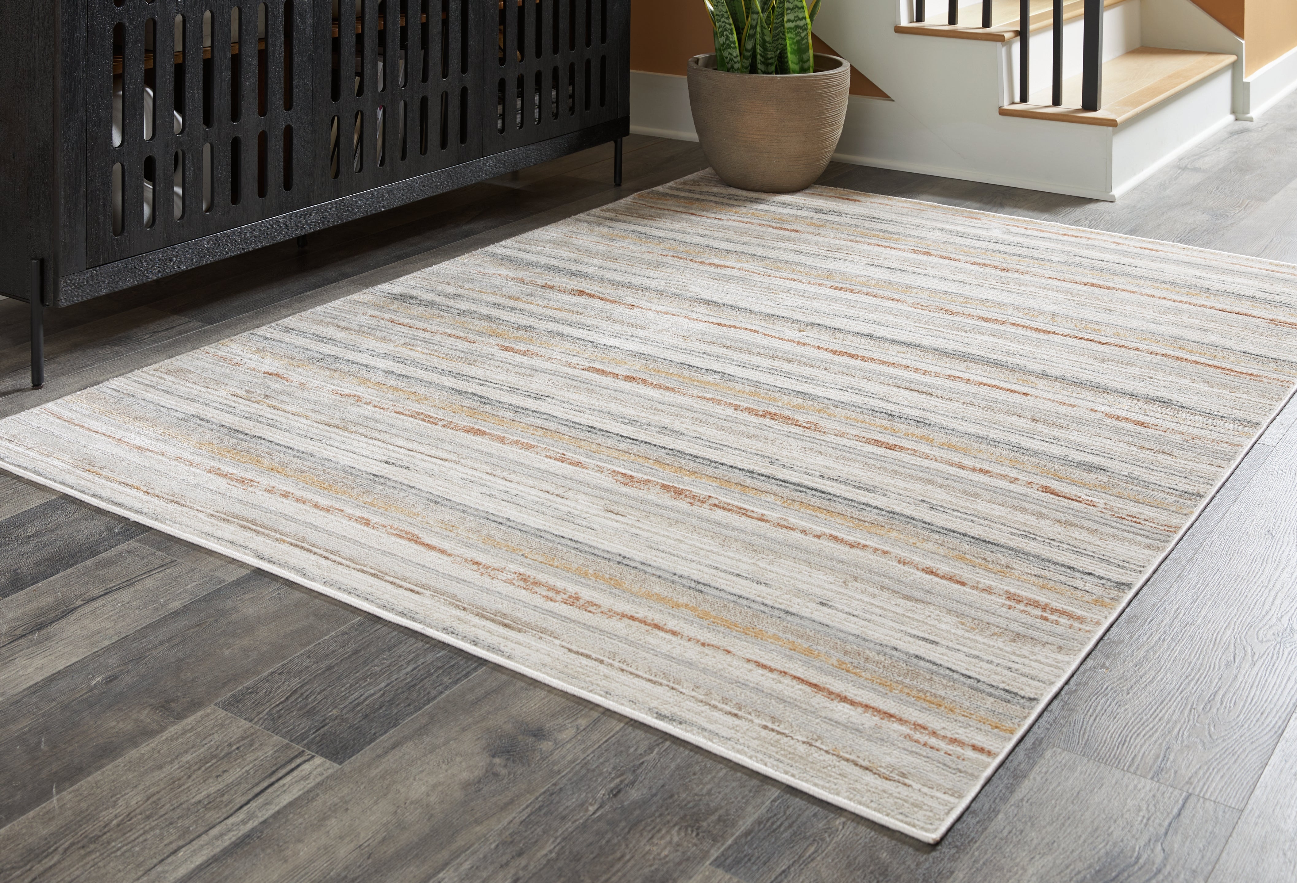Tampa Furniture Outlet Lutz - Ashley Furniture - Artney Rug - 5' x 7' Rug / Multi - R407022
