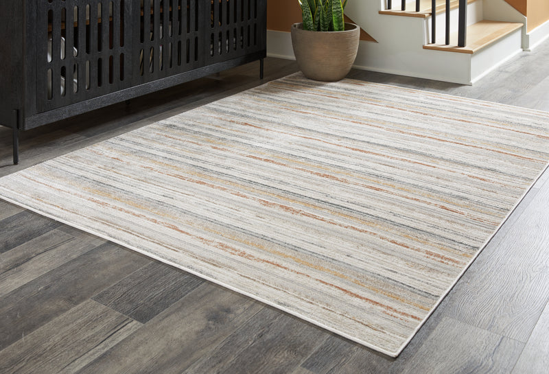 Tampa Furniture Outlet Lutz - Ashley Furniture - Artney Rug - 5&