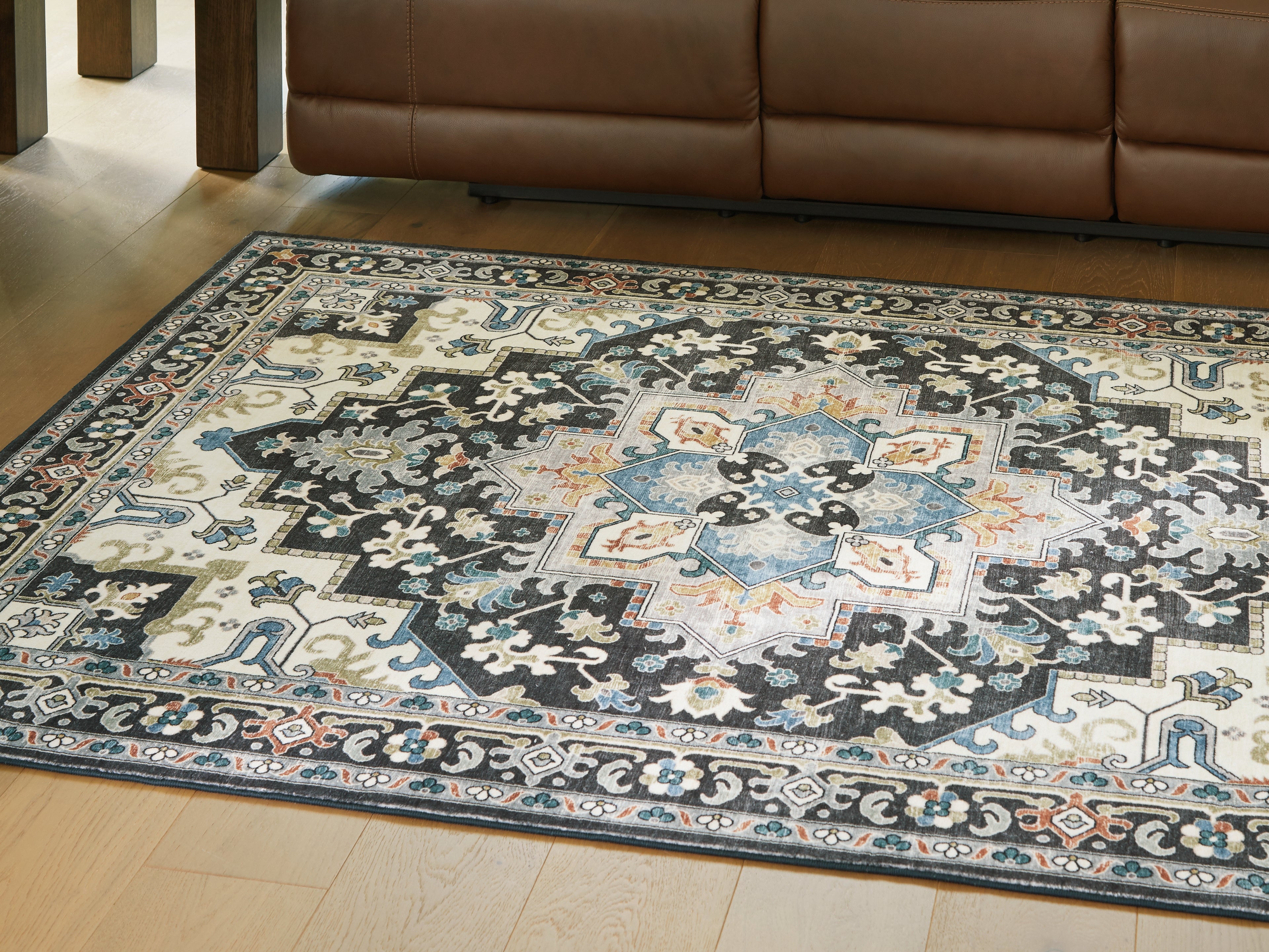 Tampa Furniture Outlet Lutz - Ashley Furniture - Leningston Rug - 5' x 7' Washable Rug / Black/Cream/Blue - R407062