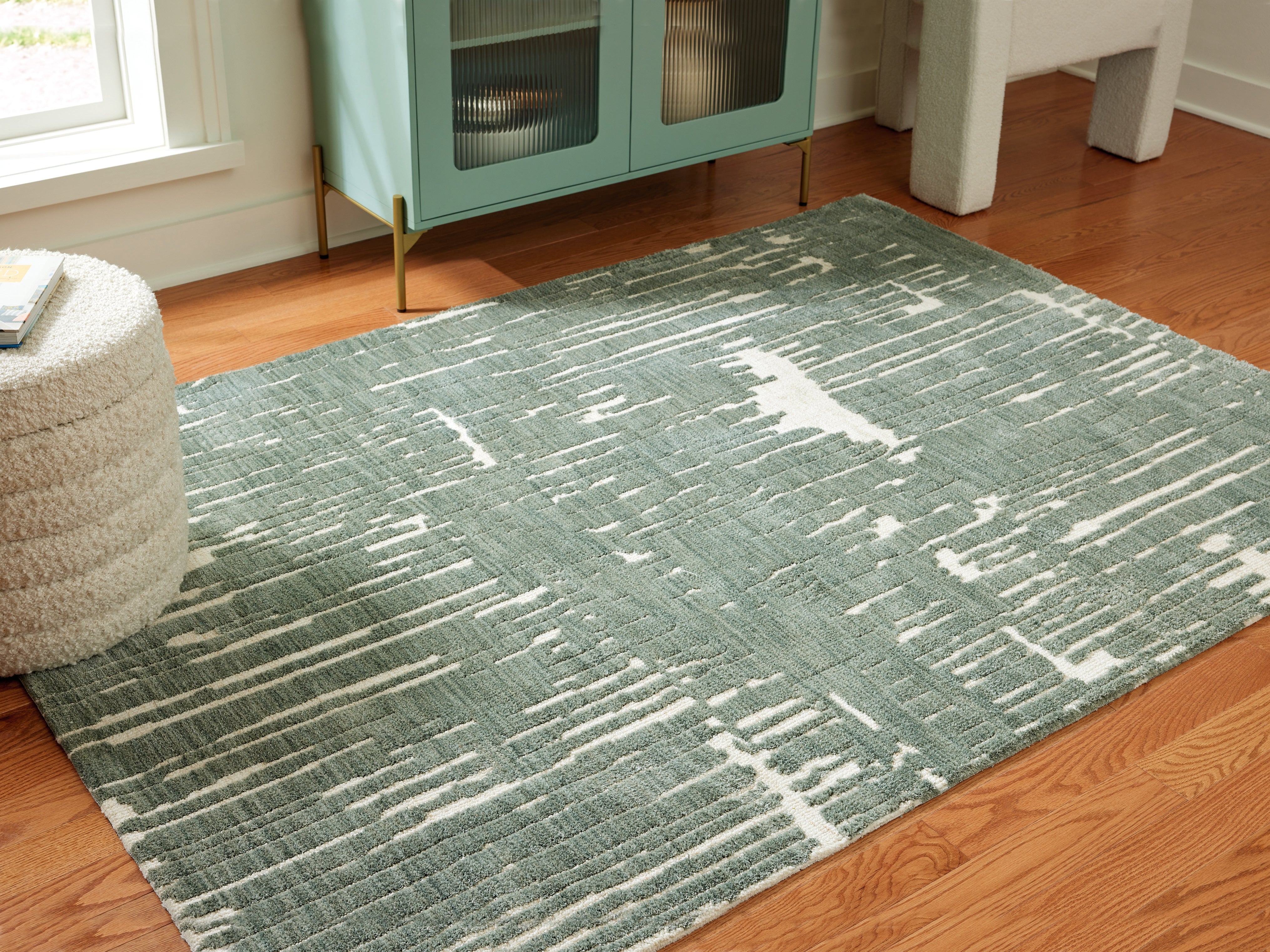 Tampa Furniture Outlet Lutz - Ashley Furniture - Cayworth Rug - 8' x 10' Rug / Teal/White - R407091
