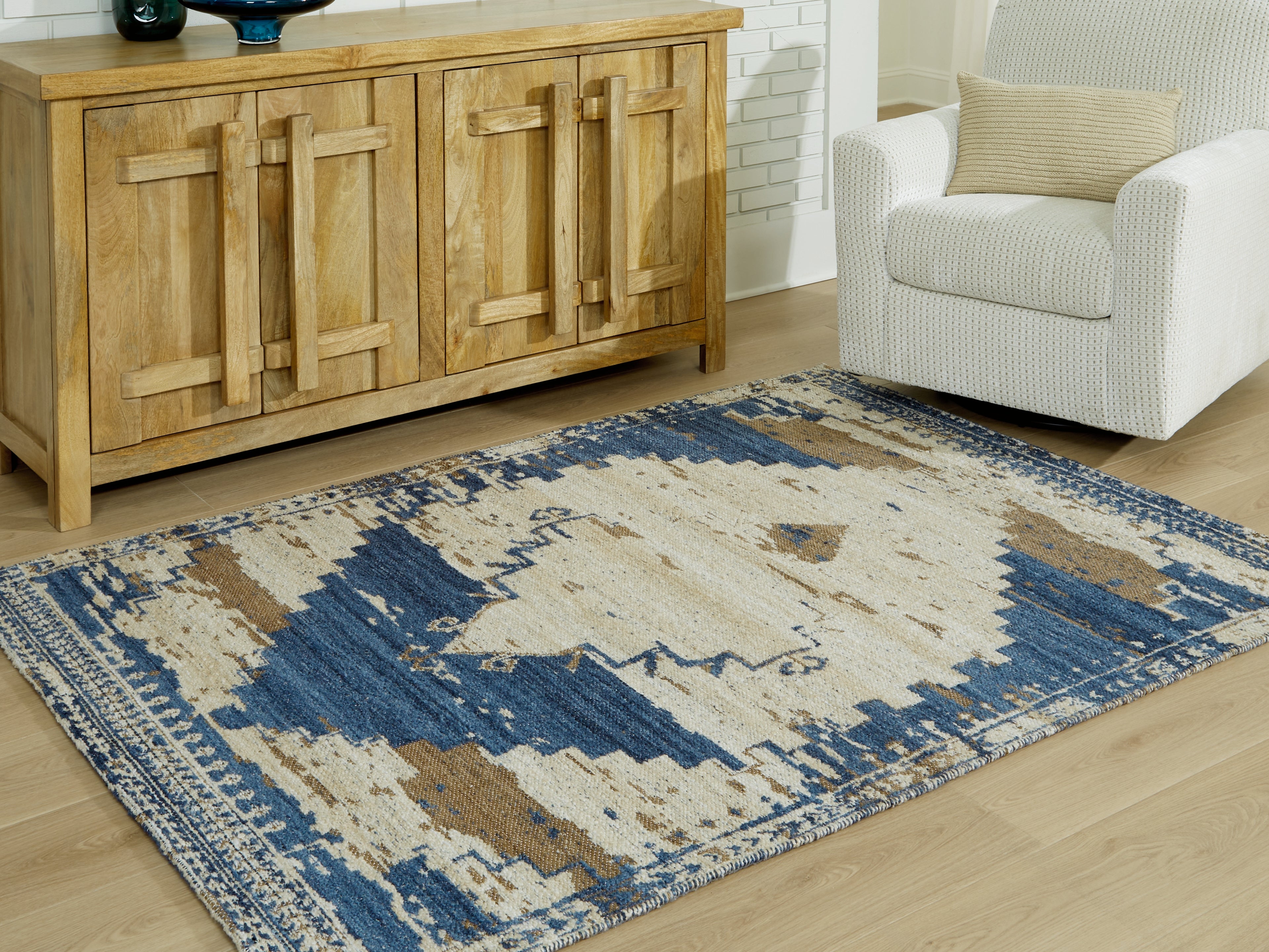 Tampa Furniture Outlet Lutz - Ashley Furniture - Varnler Rug - 5' x 7' Rug / Blue/Brown/Tan - R407132