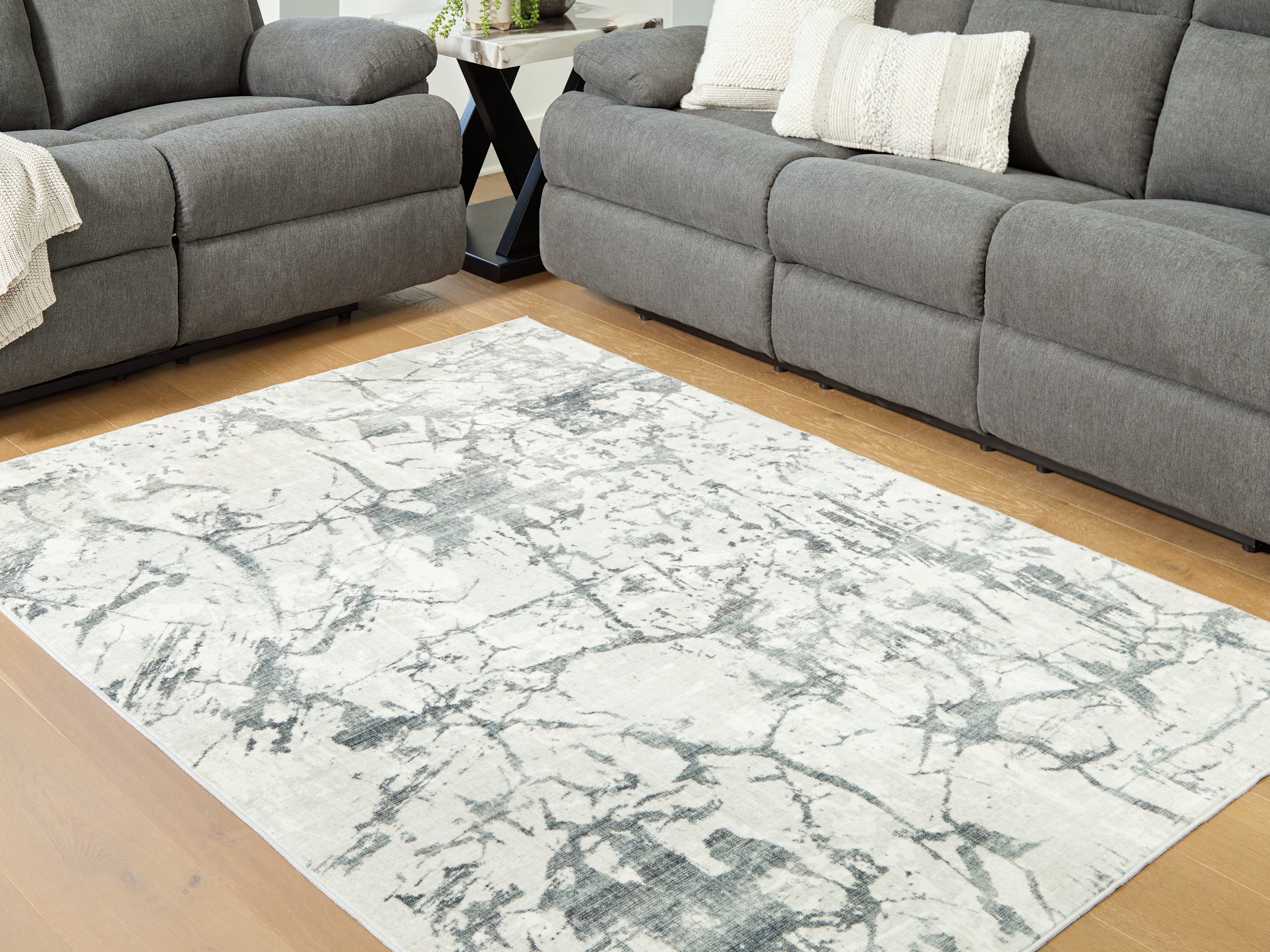 Tampa Furniture Outlet Lutz - Ashley Furniture - Tobinbury Rug - Washable 5' x 7' Area Rug / Gray - R407422