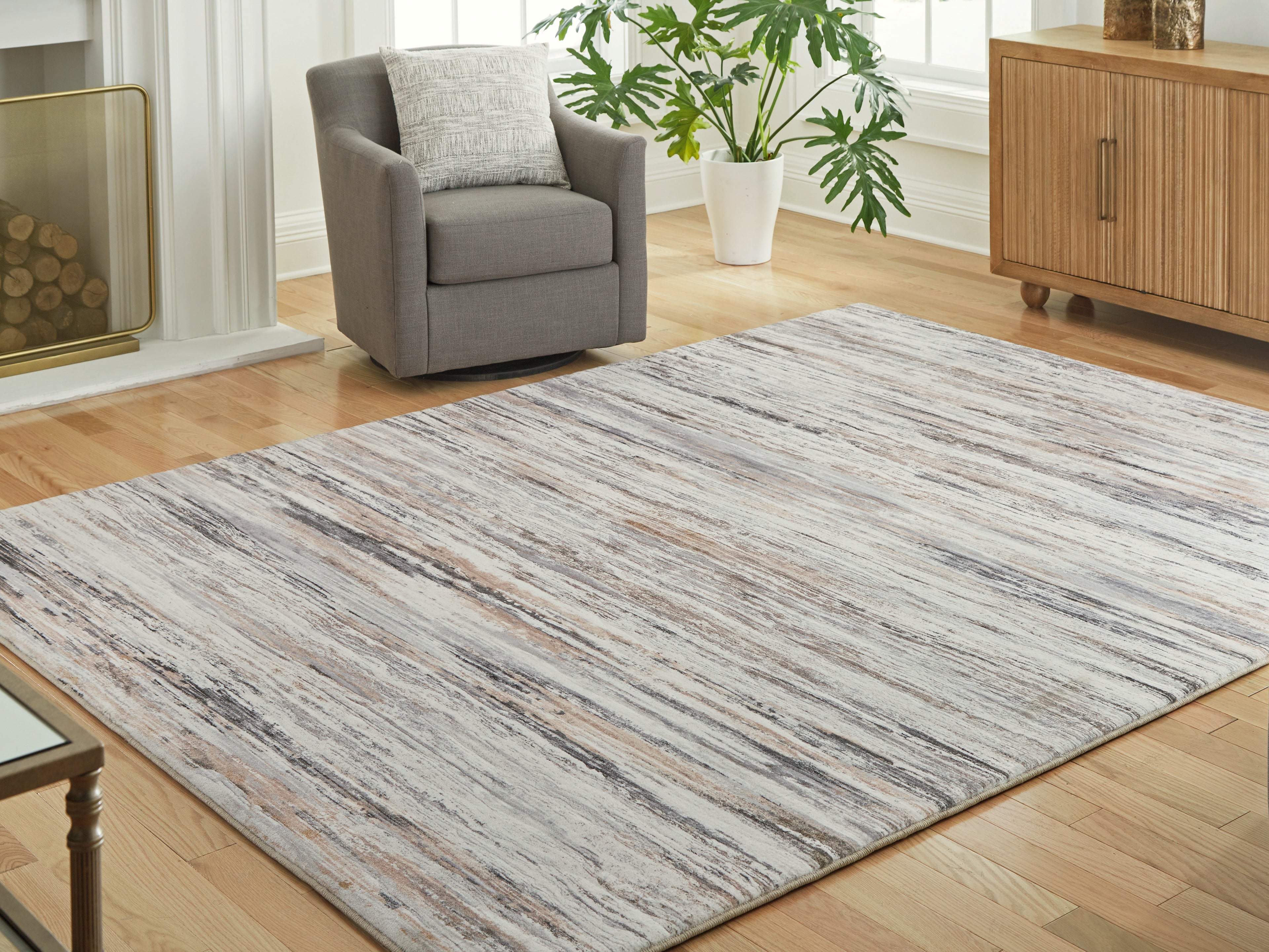 Tampa Furniture Outlet Lutz - Ashley Furniture - Nace Rug - 7'6" X 9'6" Memory Foam Area Rug / Gray/Brown/White - R407471