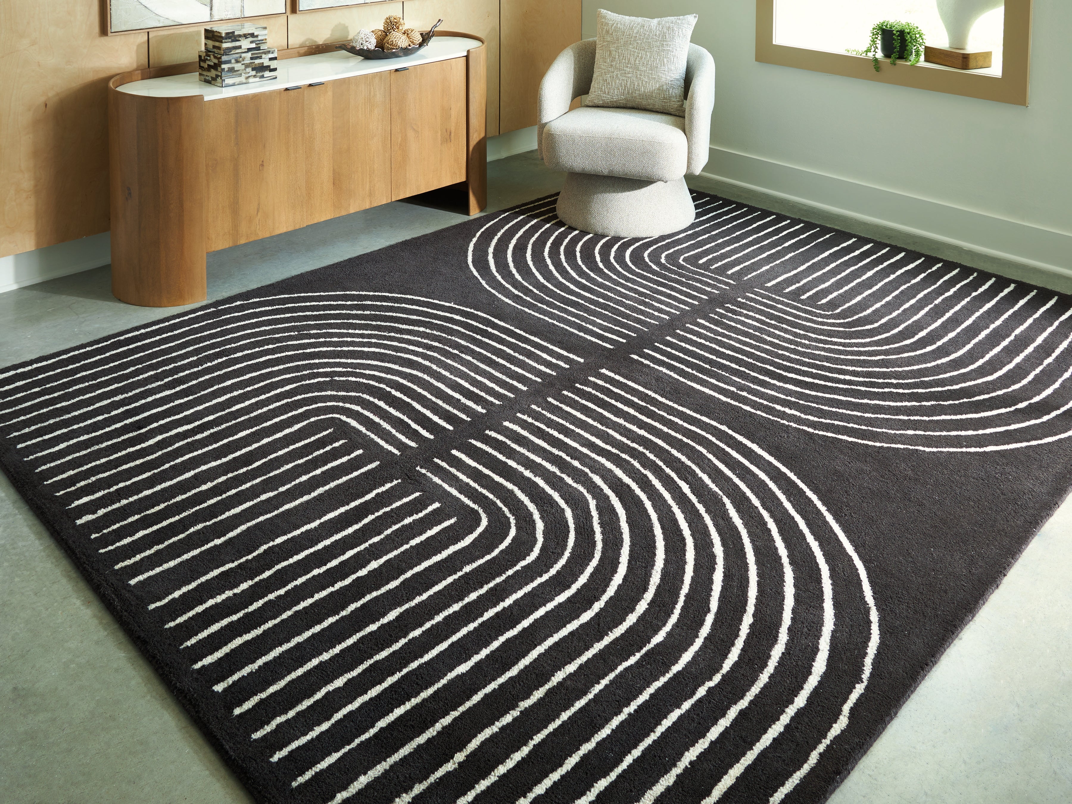 Tampa Furniture Outlet Lutz - Ashley Furniture - Eldonmore Rug - 7'8" x 10' Area Rug / Black/Ivory - R407571