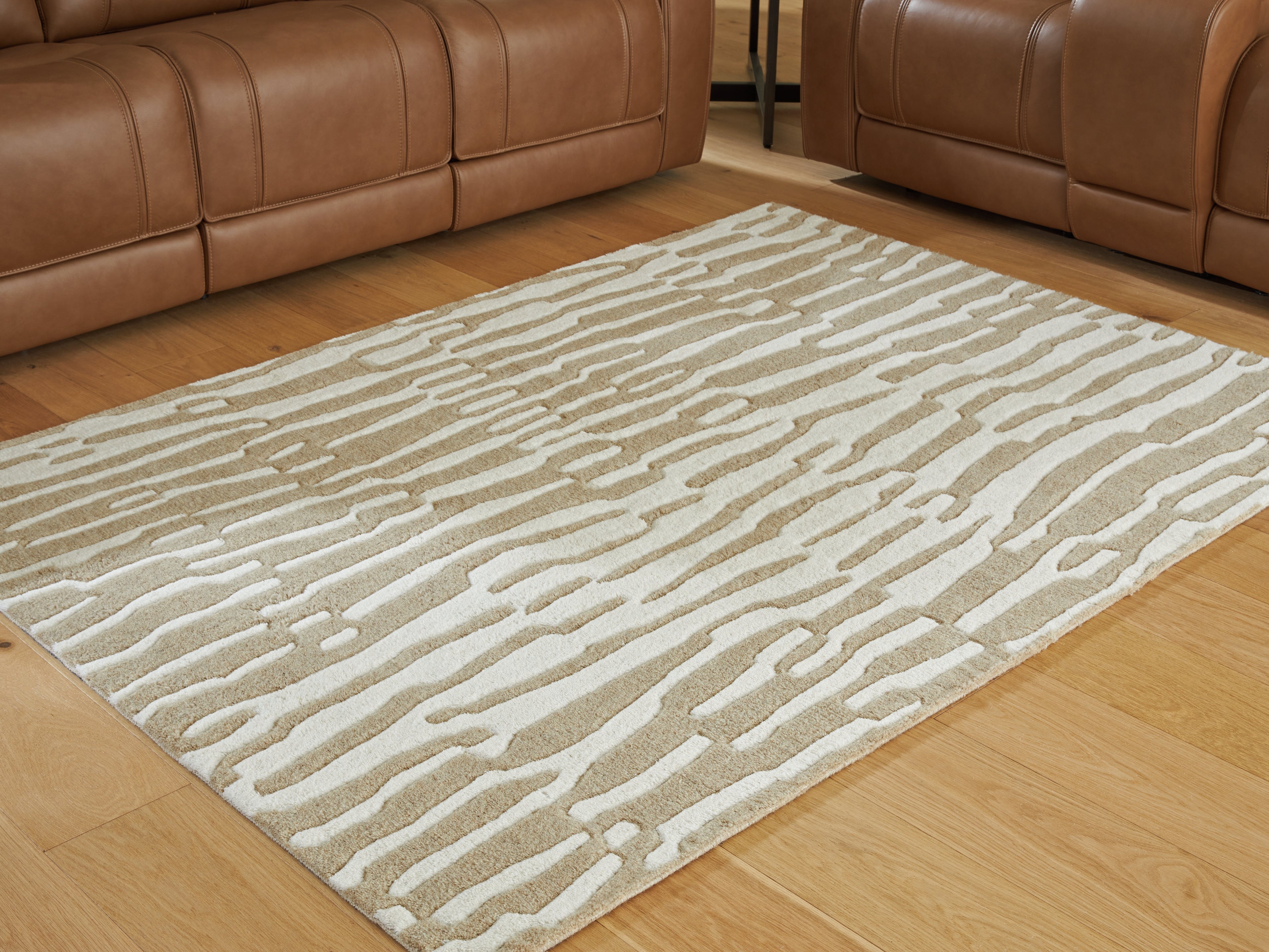 Tampa Furniture Outlet Lutz - Ashley Furniture - Corrbell Rug - 5' x 7' Area Rug / Beige/White - R407632