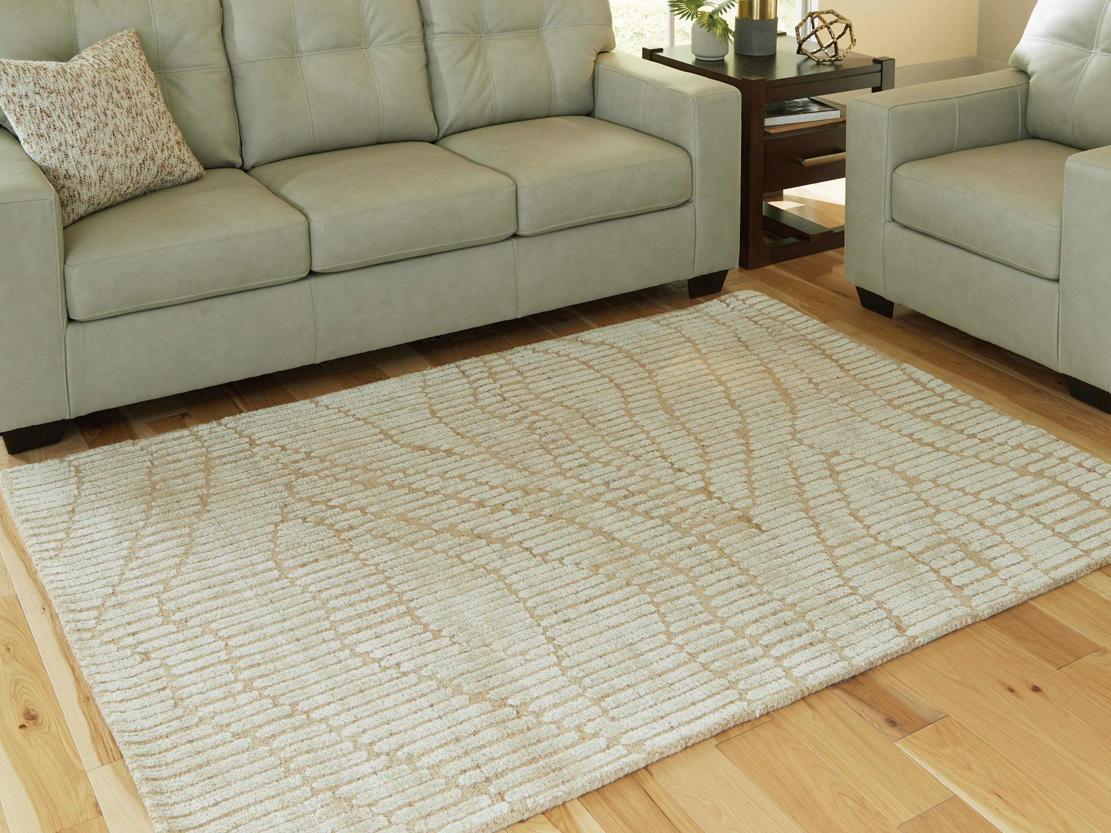 Tampa Furniture Outlet Lutz - Ashley Furniture - Jaseena Rug - 5' x 7' Area Rug / Beige/Tan - R407722