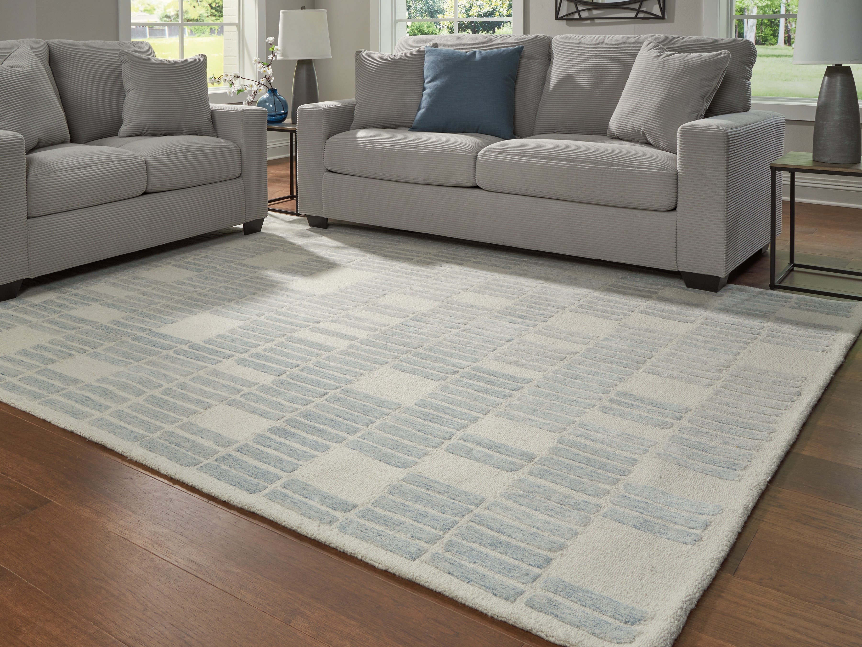 Tampa Furniture Outlet Lutz - Ashley Furniture - Dylanton Rug - 7'8" x 10' Area Rug / Ivory/Blue - R407811