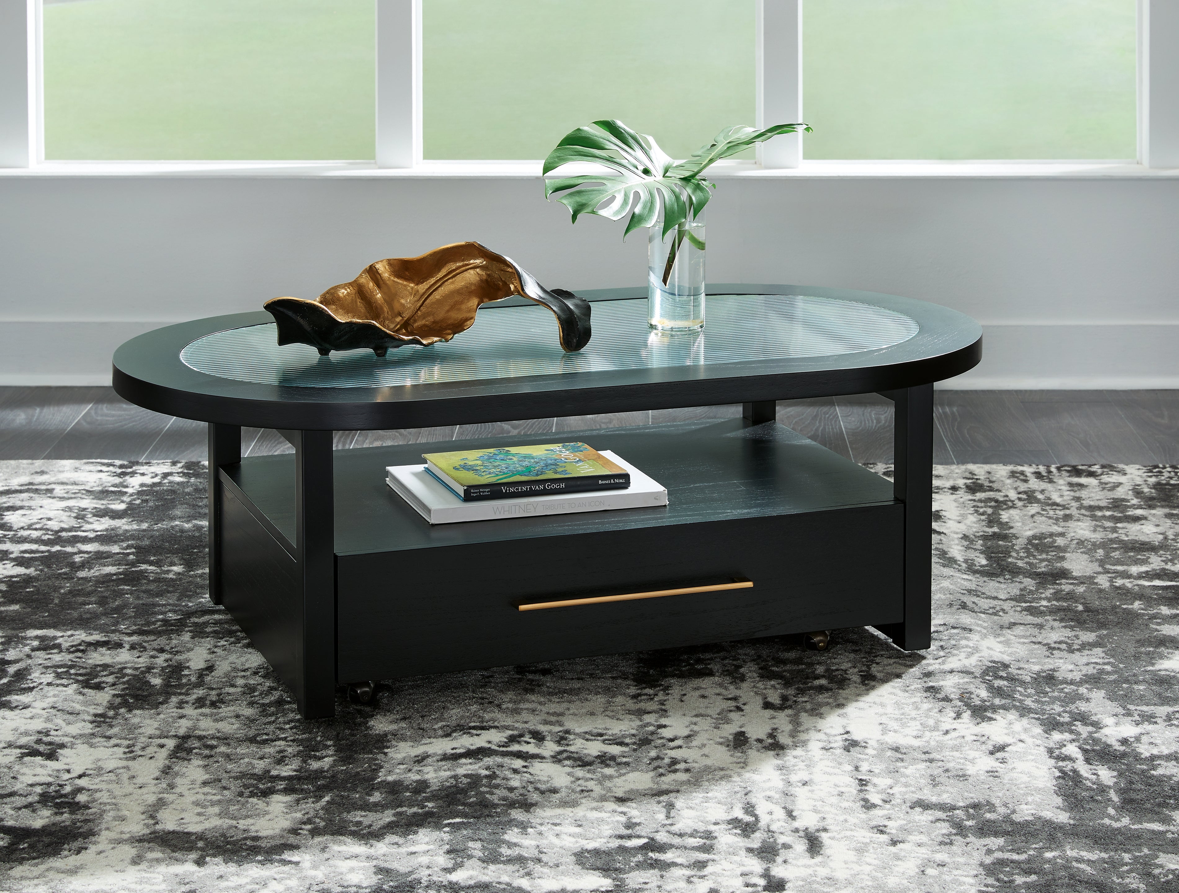 Tampa Furniture Outlet Lutz - Ashley Furniture - Winbardi Coffee Table - Oval Cocktail Table / Black - T786-0