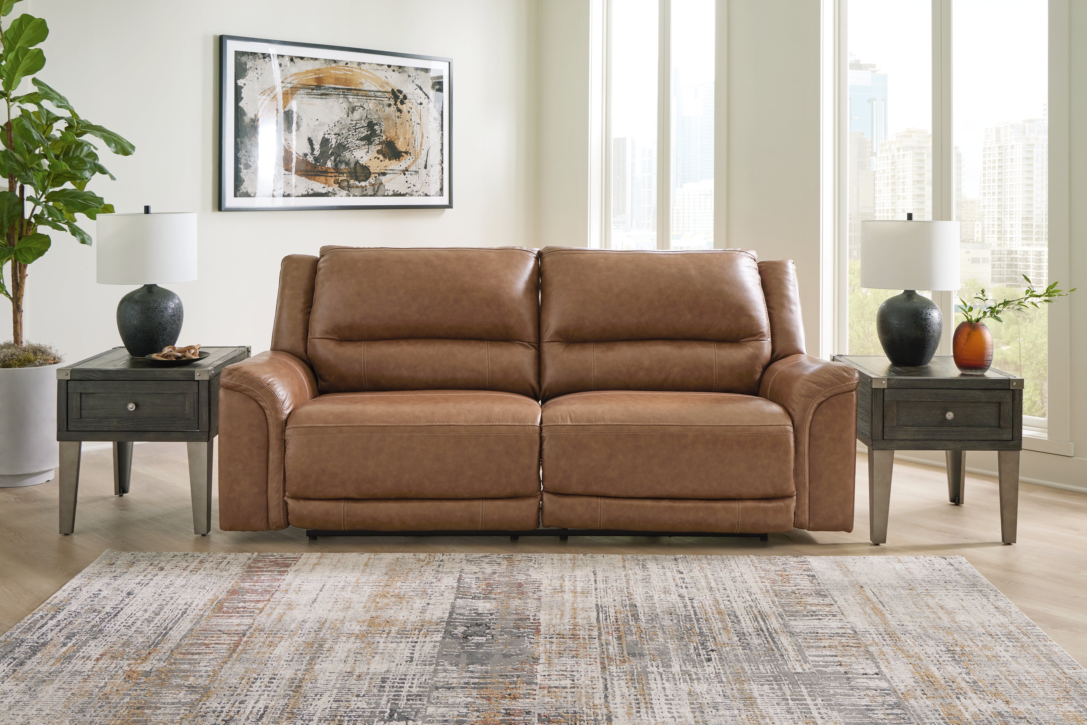 Tampa Furniture Outlet Lutz - Ashley Furniture - Trasimeno Living Room - 2 Seat PWR REC Sofa ADJ HDREST / Caramel - U8281547