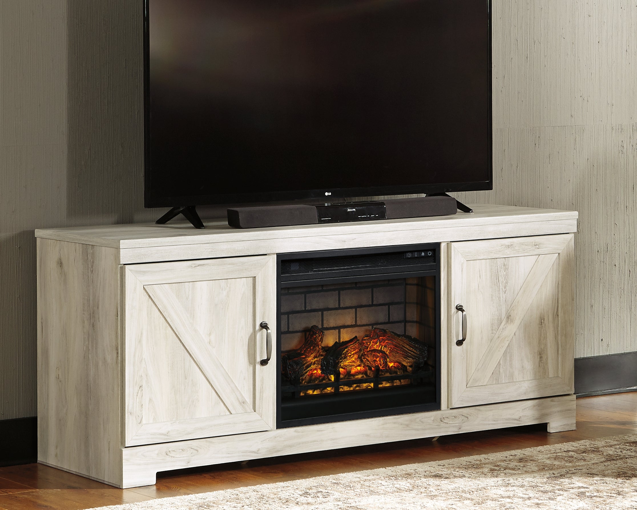 Tampa Furniture Outlet Lutz - Ashley Furniture - Bellaby 63" TV Stand with Electric Fireplace - 63" TV Stand with Electric Fireplace / Whitewash - W331W9